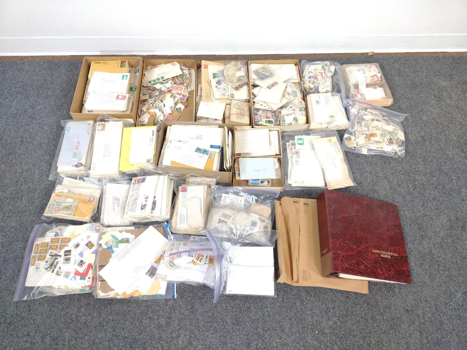 Vintage Stamps and Ephemera: Includes loose vintage stamps, commemorative mint sets, album, and stamps on envelopes with letters. Includes Bicentennial, Christmas, Spanish, and more. 