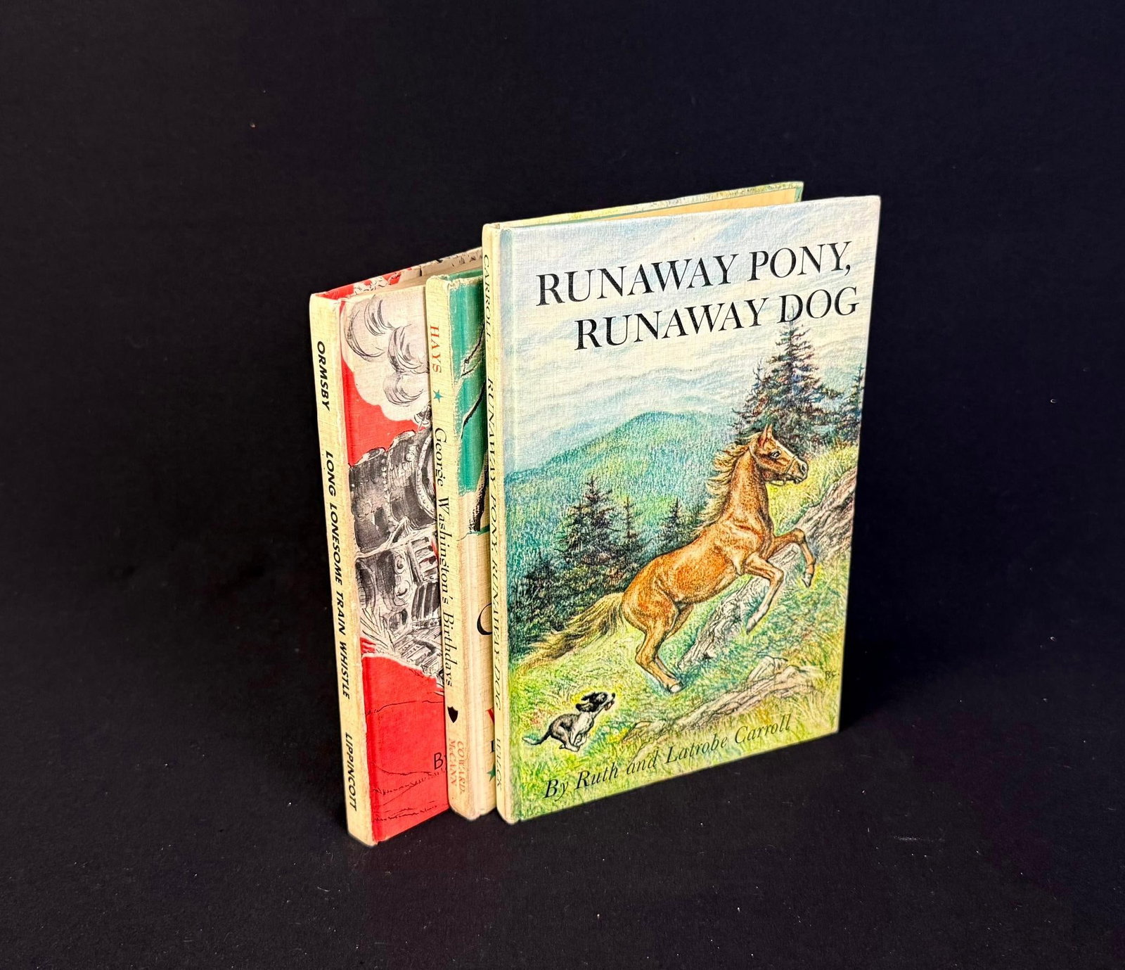 3 Children's Books Signed by the 1966 Kansas City Chiefs: All 3 books signed by the 1966 Kansas City Chiefs (Also the team that played in the first super bowl.) Included signatures Walt Corey, Fred Williamson, Bobby Bell, Jerry Mays, Kenny Vaughn, 