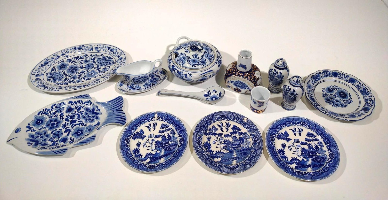 13 Pieces of Blue & White Porcelain: Includes Limoges. 2-3/4" to 9-1/4" wide x 3-1/4" to 3-1/2" high. 
