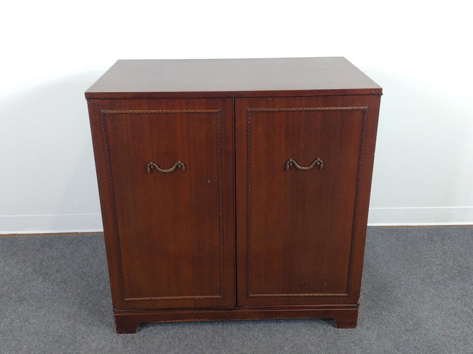 Sheet Music or Record Cabinet: 35-1/4" wide X 21-1/4" deep X 36" high. Has some light scratches. Missing small area of veneer. 