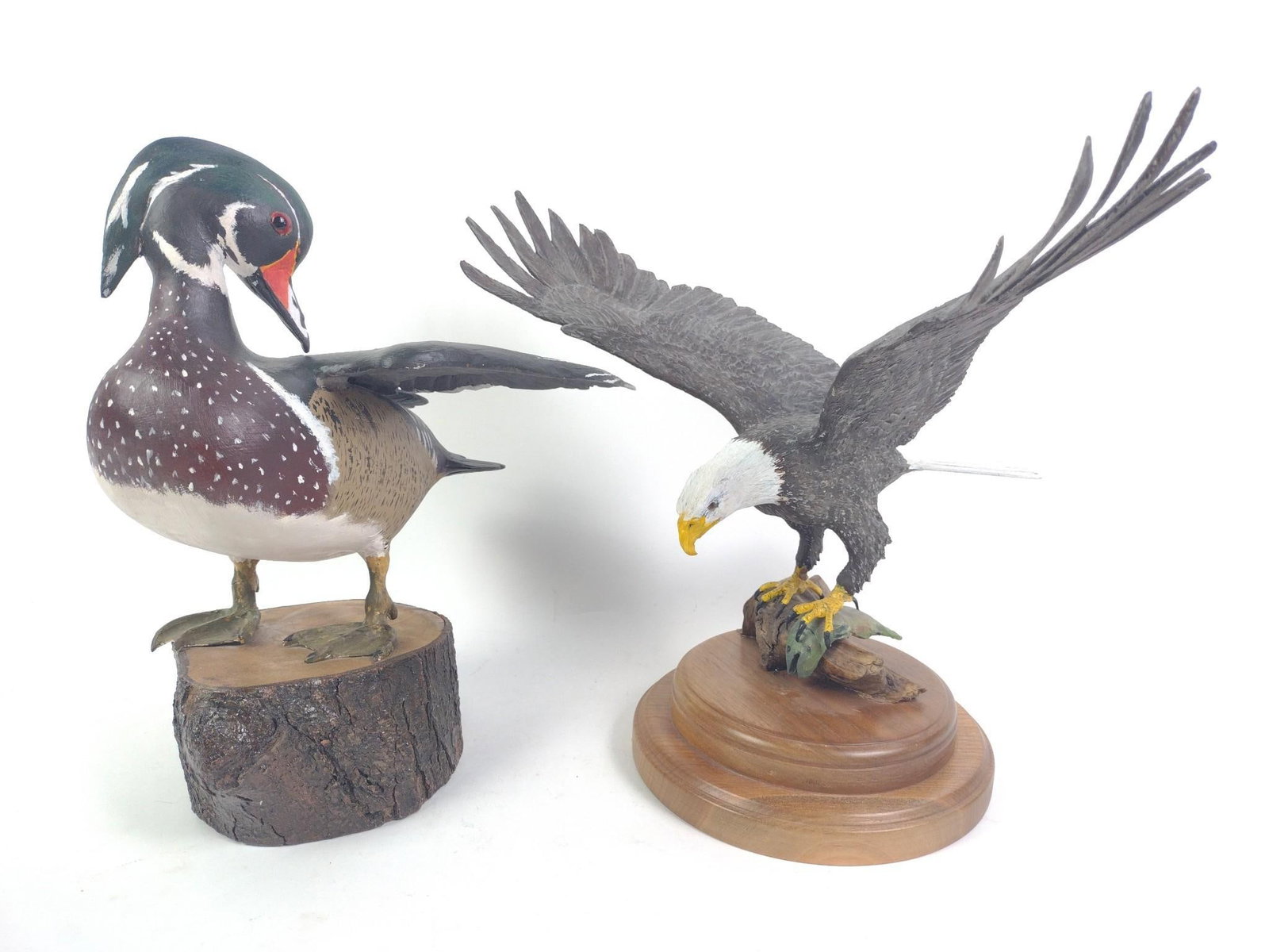 2 Herb Cox Carved Birds: Both signed. 7-1/4" to 8-1/2" wide x 13-1/2" to 13-3/4" high. 