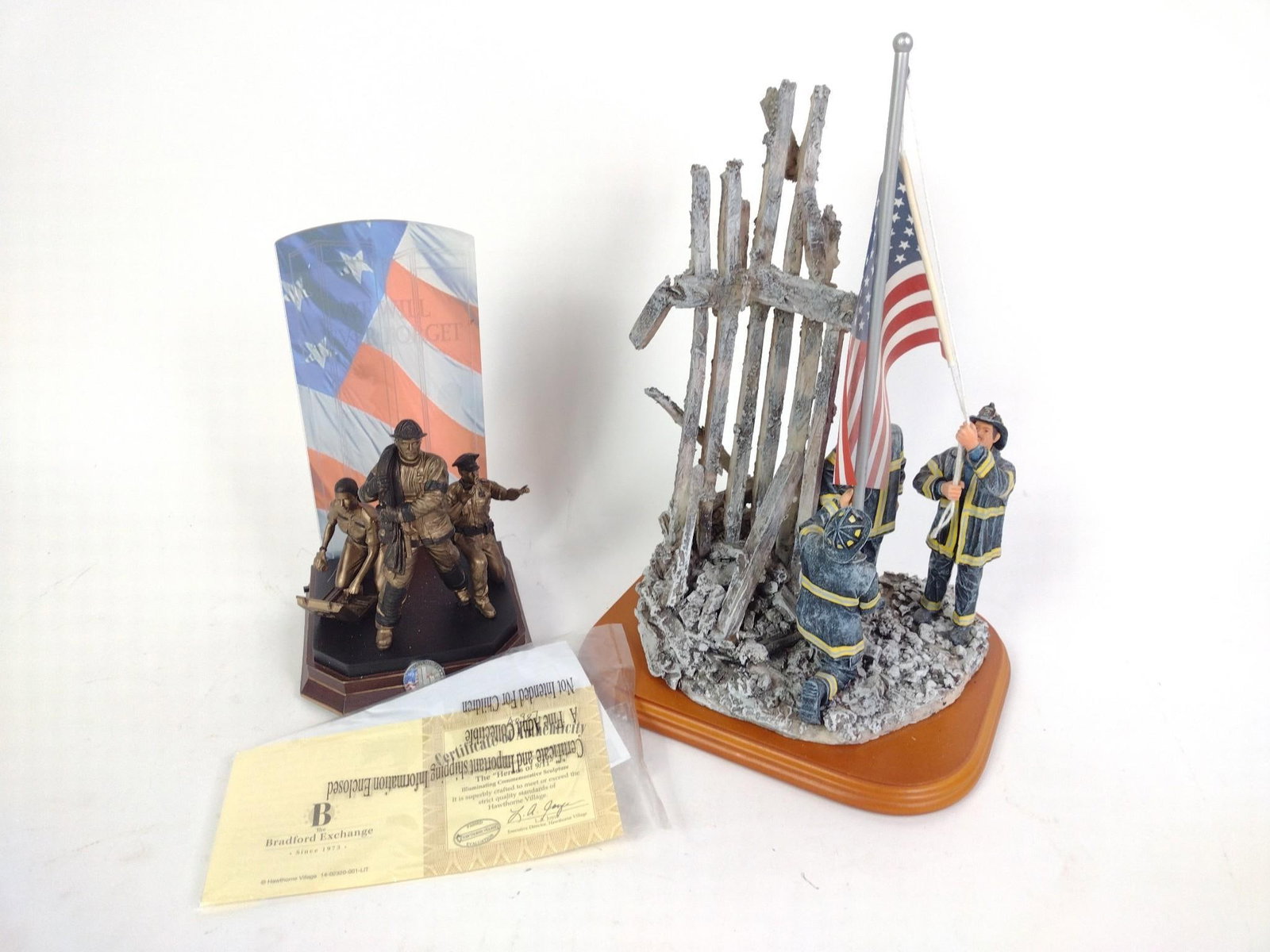 2 9/11 Memorial Figurines: 5-1/4" to 8-1/4" wide x 9-1/4" to 11-1/2" high. 