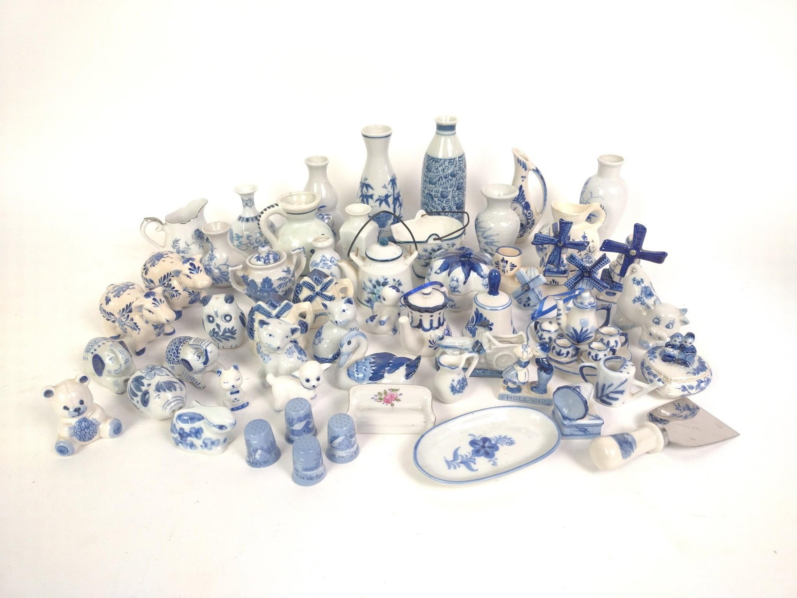 54 Pieces of Blue & White Porcelain: 1" to 2" wide x 1-1/2" to 4" high. 