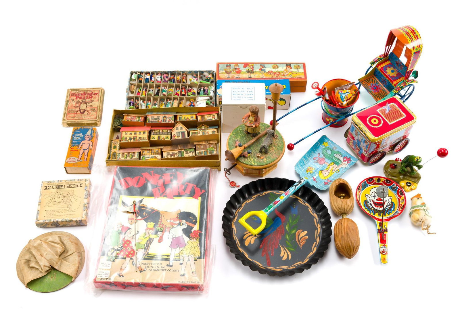 Vintage Toys and Figurines: Includes a working Thorens music box, a miniature town and people, a nutcracker, a happy bird, a hand-painted planter, a second working dancing clown music box, and more. All in good condition th