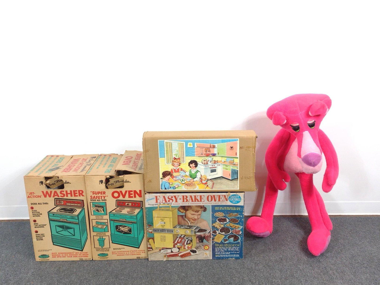 Suzy Homemaker and Pink Panther Novelty Plush: Includes Suzy Homemaker "Super Safety" Oven, Suzy Homemaker "Jet-Action" Washer and a Martin Fuchs tin dollhouse kitchen set. All in original boxes. Oven and washer boxes measure 14-1/2" x 12-3/4" x