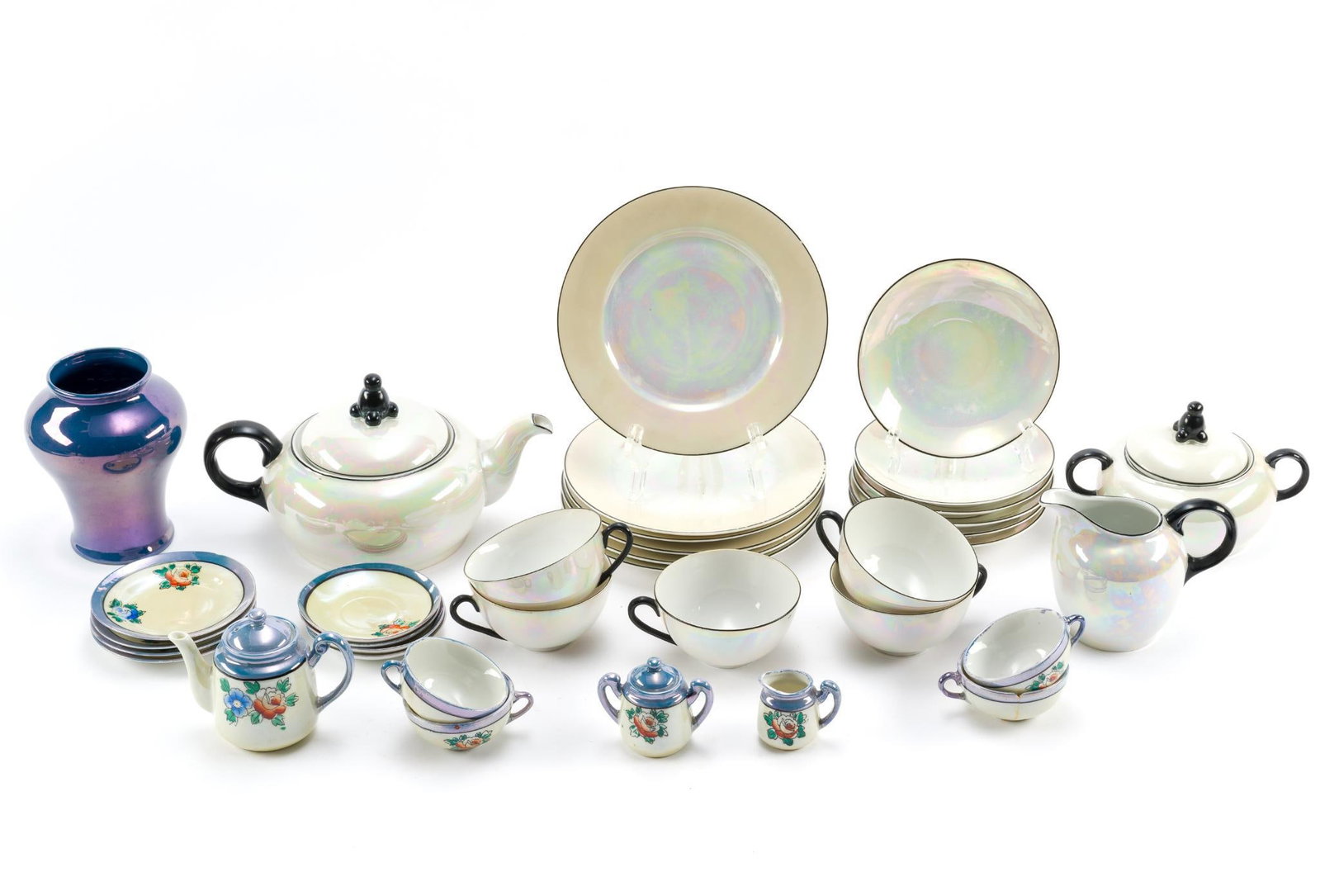 36 Pieces of Lustreware: Cups measure 2-3/4" to 3-3/4" diameter x 1-1/4" to 2" high. 
