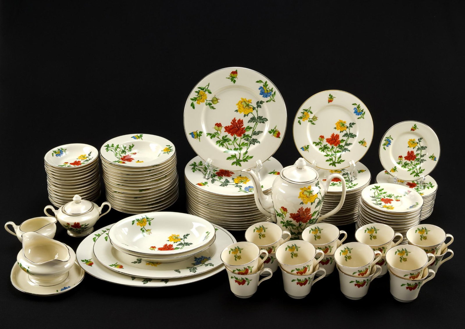 American Manor Malin Dinner Service: Includes teapot, cups, saucers, dinner plates, and serving bowls. The smallest piece measures 3-1/2"; the largest piece measures 10-3/4".