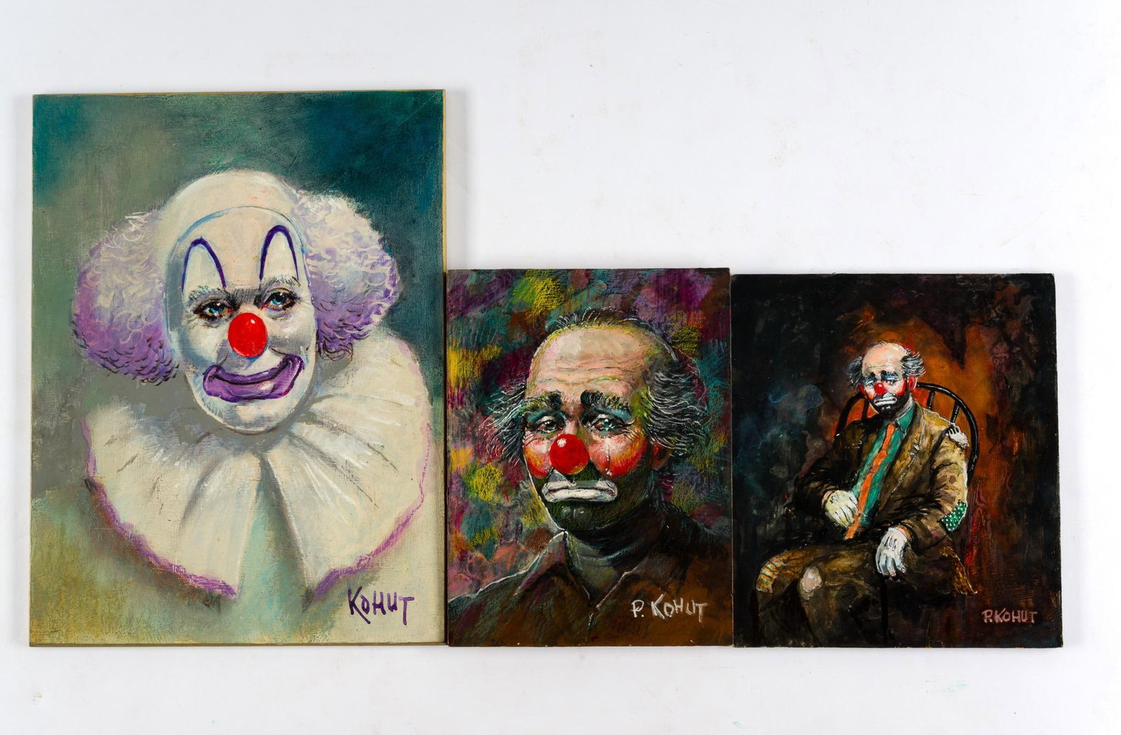 3 Clown Paintings By Petro Kohut: Includes 3 clown paintings, signed by artist Petro Kohut, various articles about Kohut, and a letter from his sister about him and his work. All in good condition. Smallest painting measures 6 x 8";