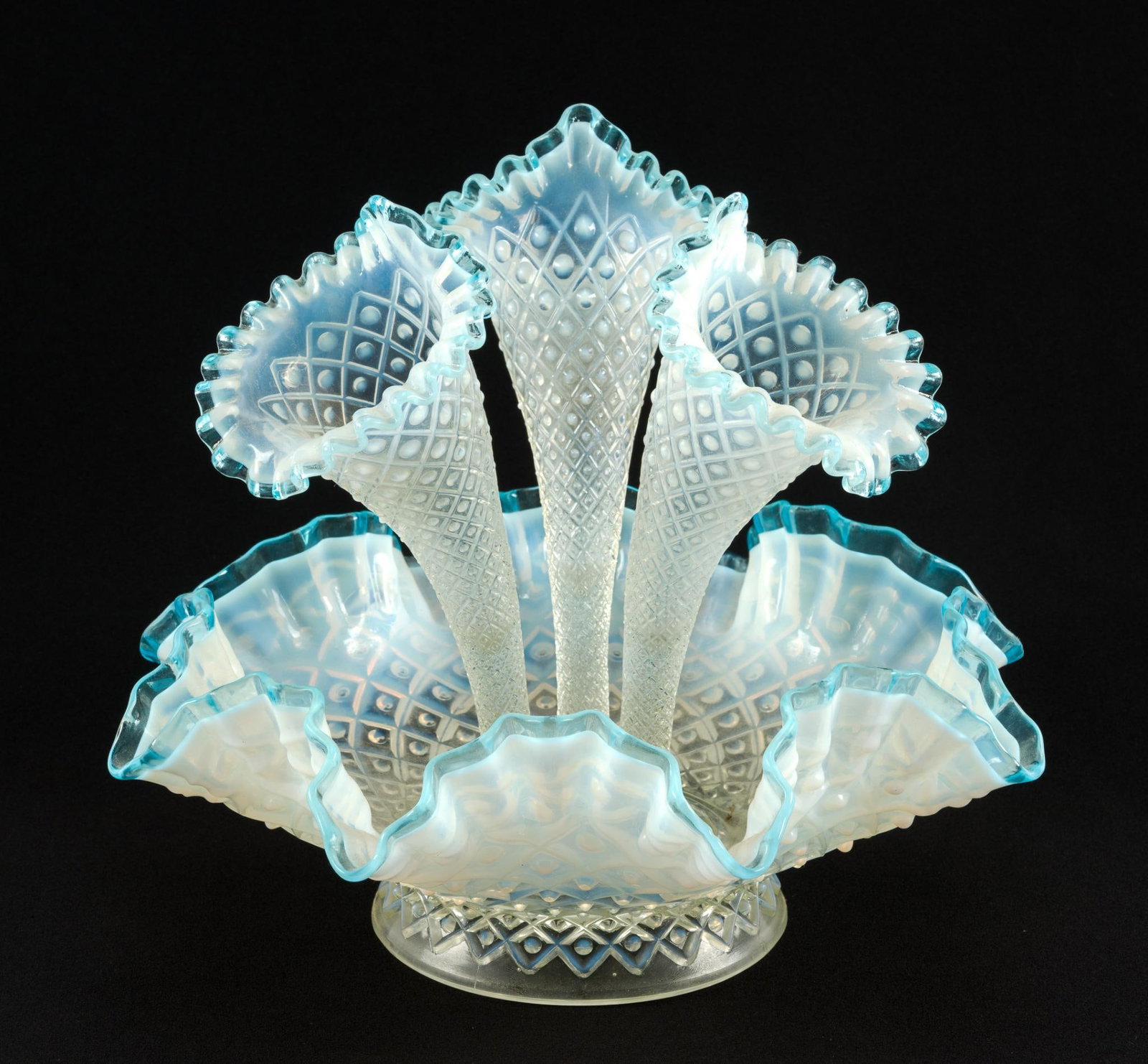Fenton Style Blue Opalescent Epergne: Fenton-style 3-horned epergne with a blue hue on the tips and ends. The bowl measures 12-1/2" in diameter. The horns measure ~9-1/2" high. 