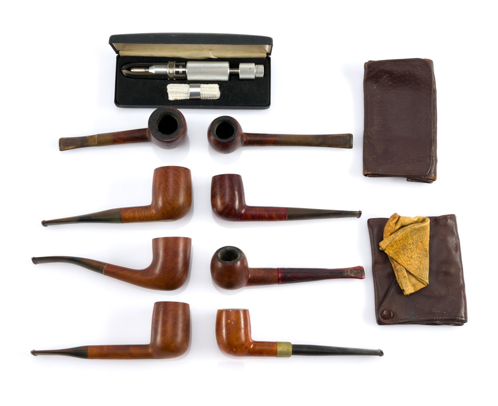 Vintage Pipes & Accessories: Includes 8 vintage pipes, "Kleen Reem Pipe Tool", and 3 tobacco pouches. All in fair condition, consistent with age and use. The smallest piece measures 3"; the largest measures ~6". 