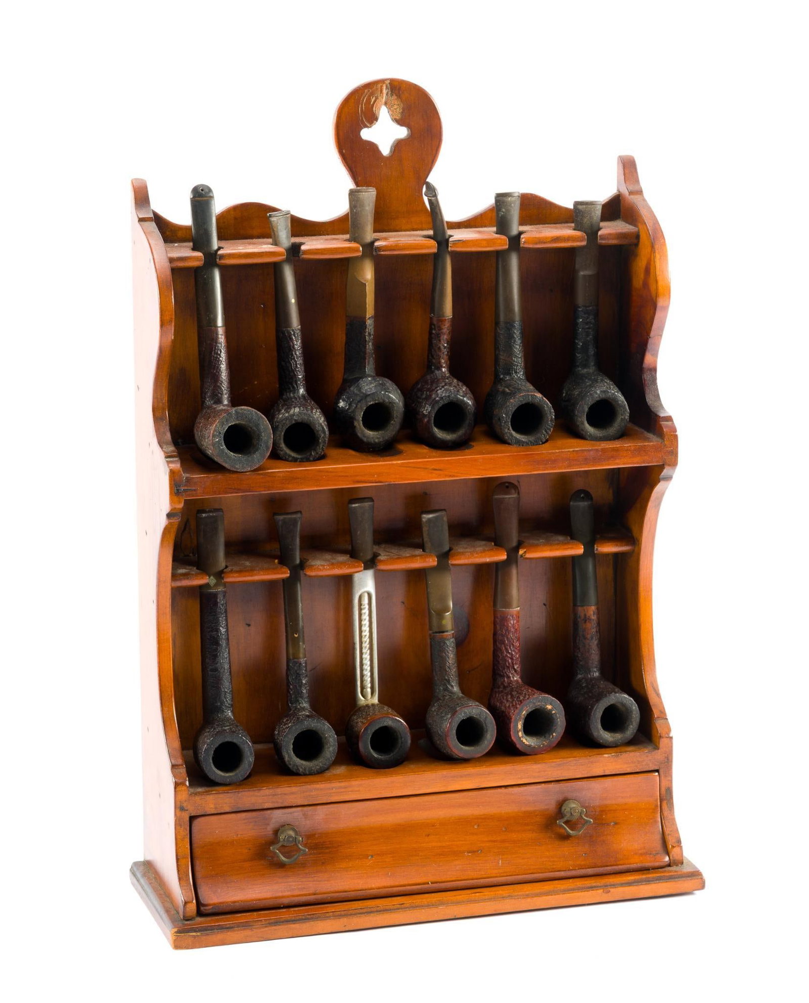 Pine-Tique Wooden Pipe Rack with Pipes: Includes 12 vintage pipes, a wooden rack with the "Pine-Tique: Muskegon, Michigan" stamp, and drawers for storage. In fair condition. "113" written in marker on the back. Measures 11-3/4" L x 4-1/4" D