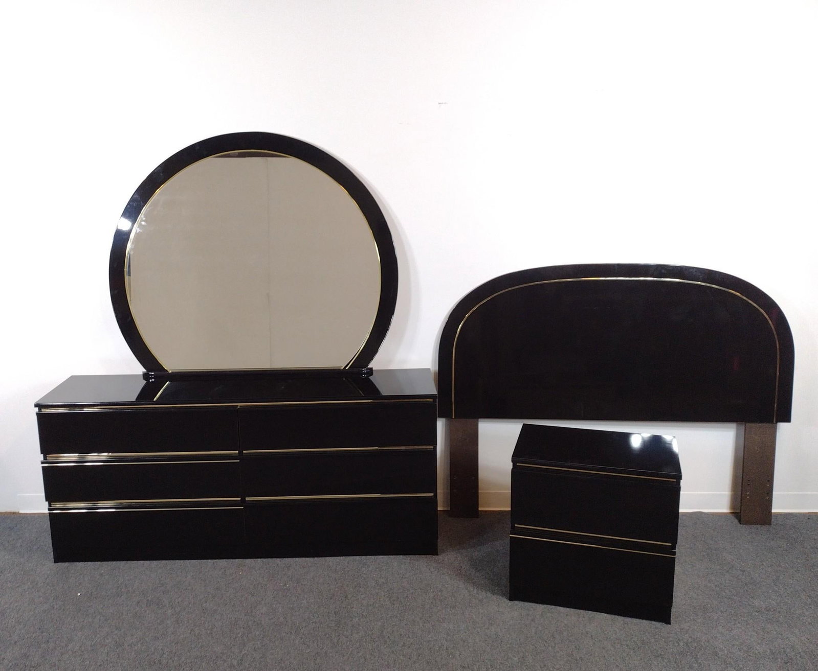 1980s Postmodern Piano Black Bedroom Set: Bed 64-1/2" wide X 74-1/2" deep X 49-1/2" high. Dresser with mirror 68" wide X 17" deep X 77" high. Night Stand 24" wide X 16" deep X 24-1/2" high. All pieces have light scuffs. No manufactures name f