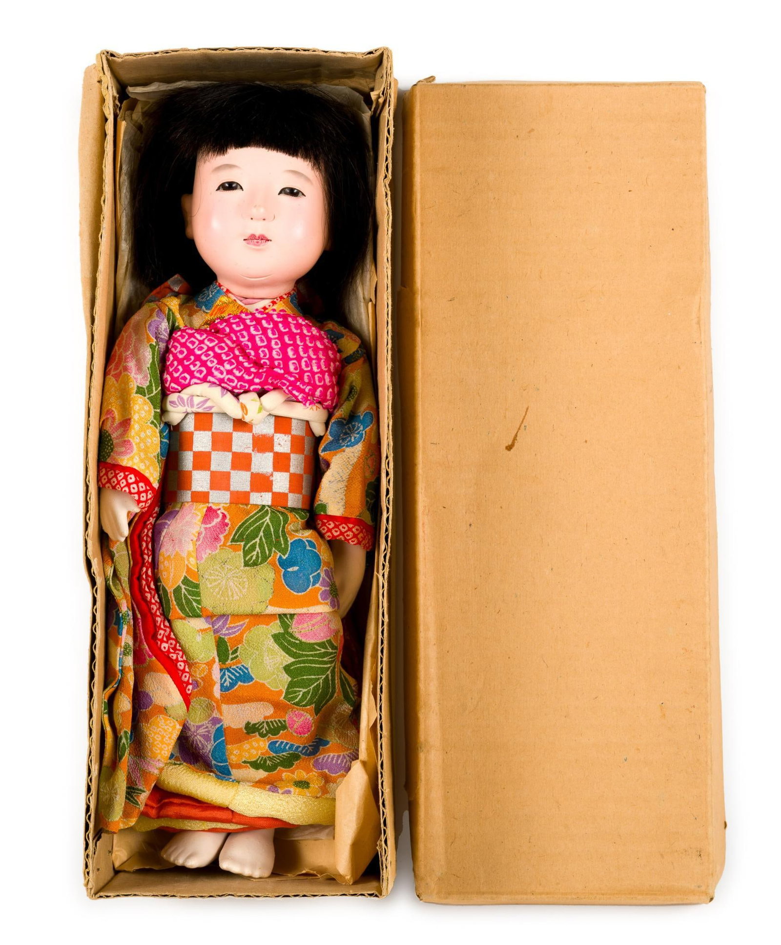 Japanese Ichimatsu Doll: These are traditional dolls that represented little boys and girls. They are commonly used for interior decoration. In original box. 6" wide X 3-1/4" deep X 14" high. 