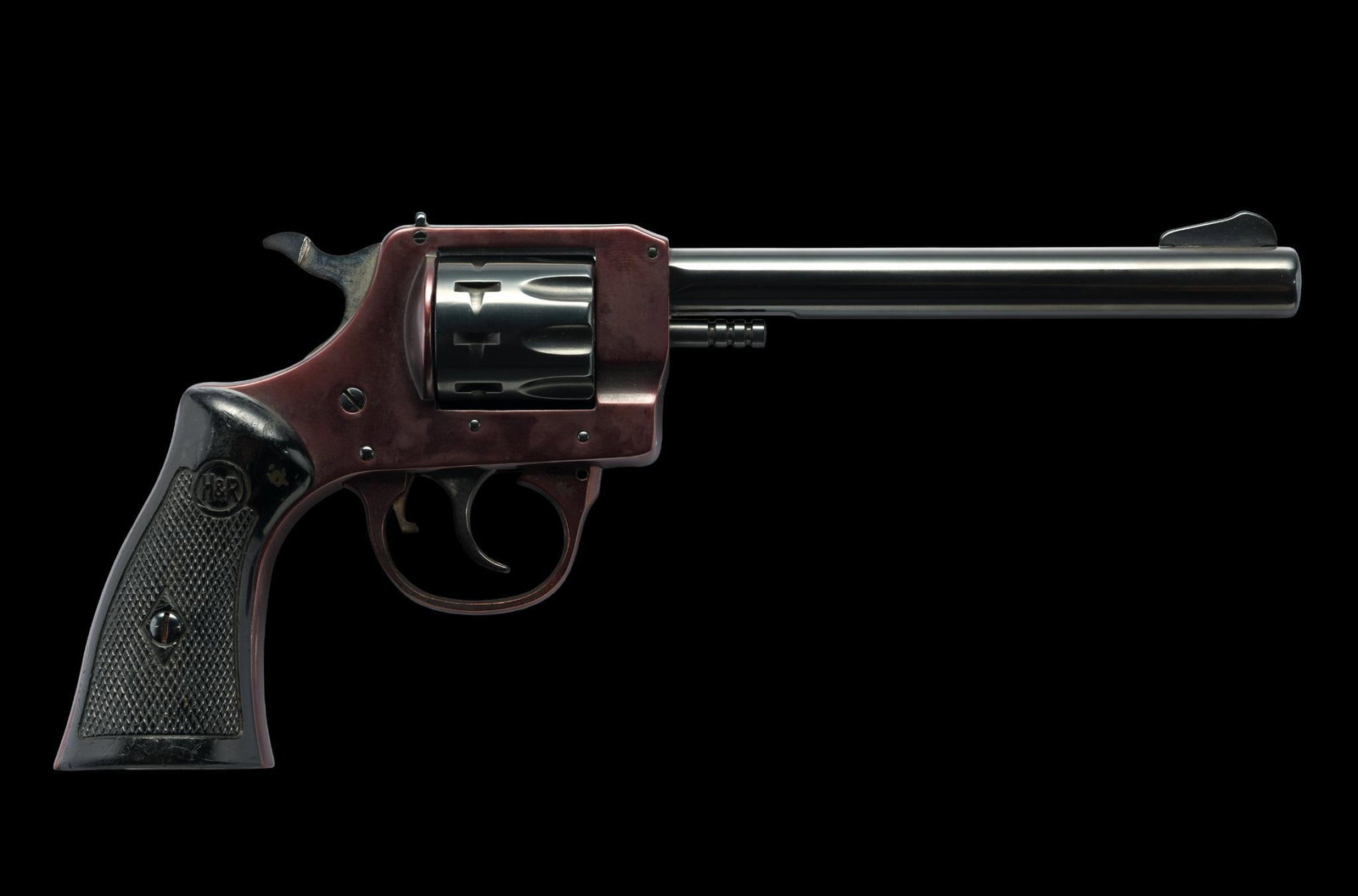 H&R Model 929 Double Action Revolver, Cal .22 lr: Serial No. AC73395 This Harrington & Richardson model 929 has a 6" barrel and a 9 shot swing out cylinder. Black composition factory grips. Those revolvers were made from the mid-20th century through