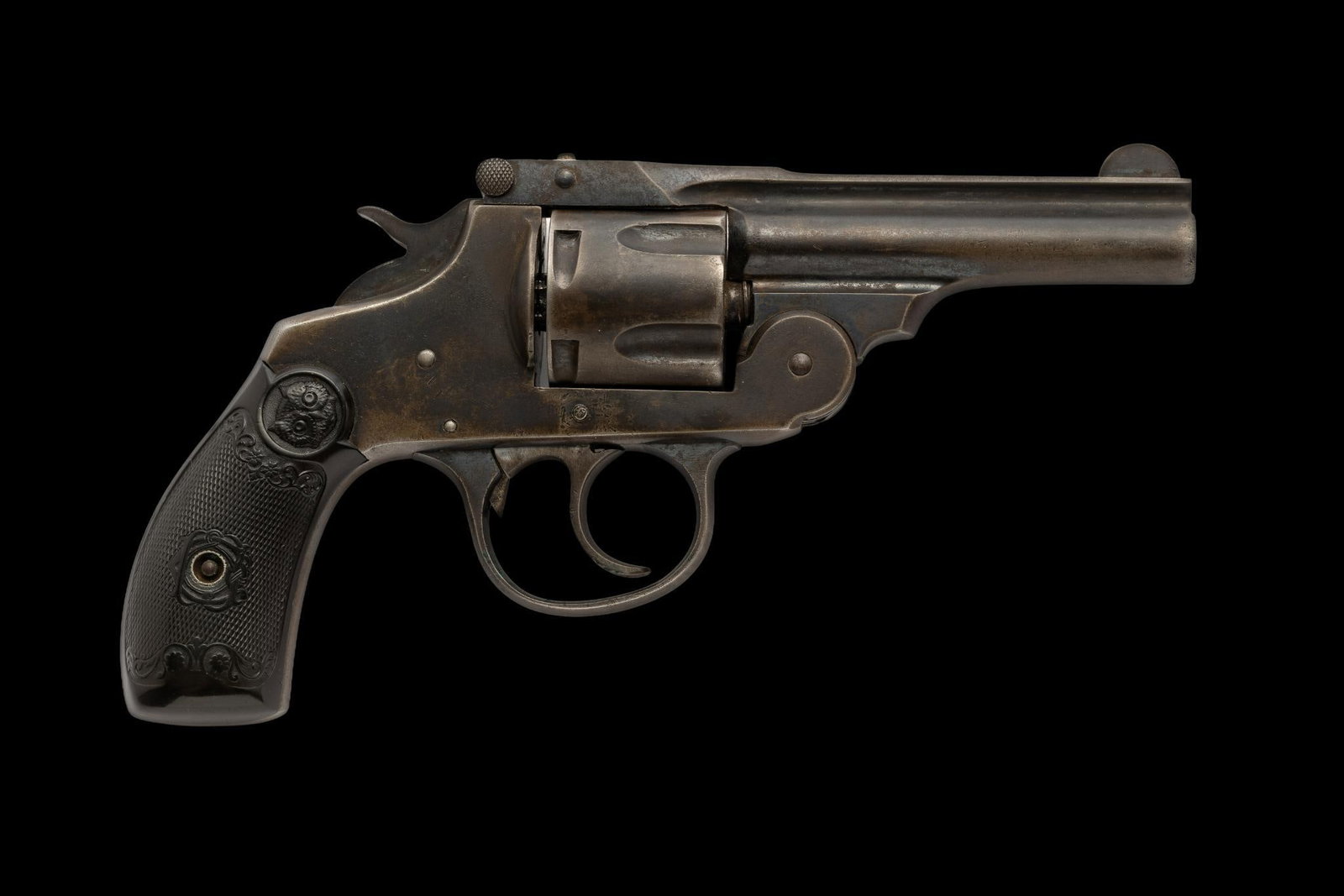 Iver Johnson Double Action Revolver, Cal. 38 S&W: Serial No. 34726 This Iver Johnson double action revolver dates to the early 20th century and has a 3-1/4" barrel and a five shot cylinder chambered for the .38 S&W cartridge. The blued finish is