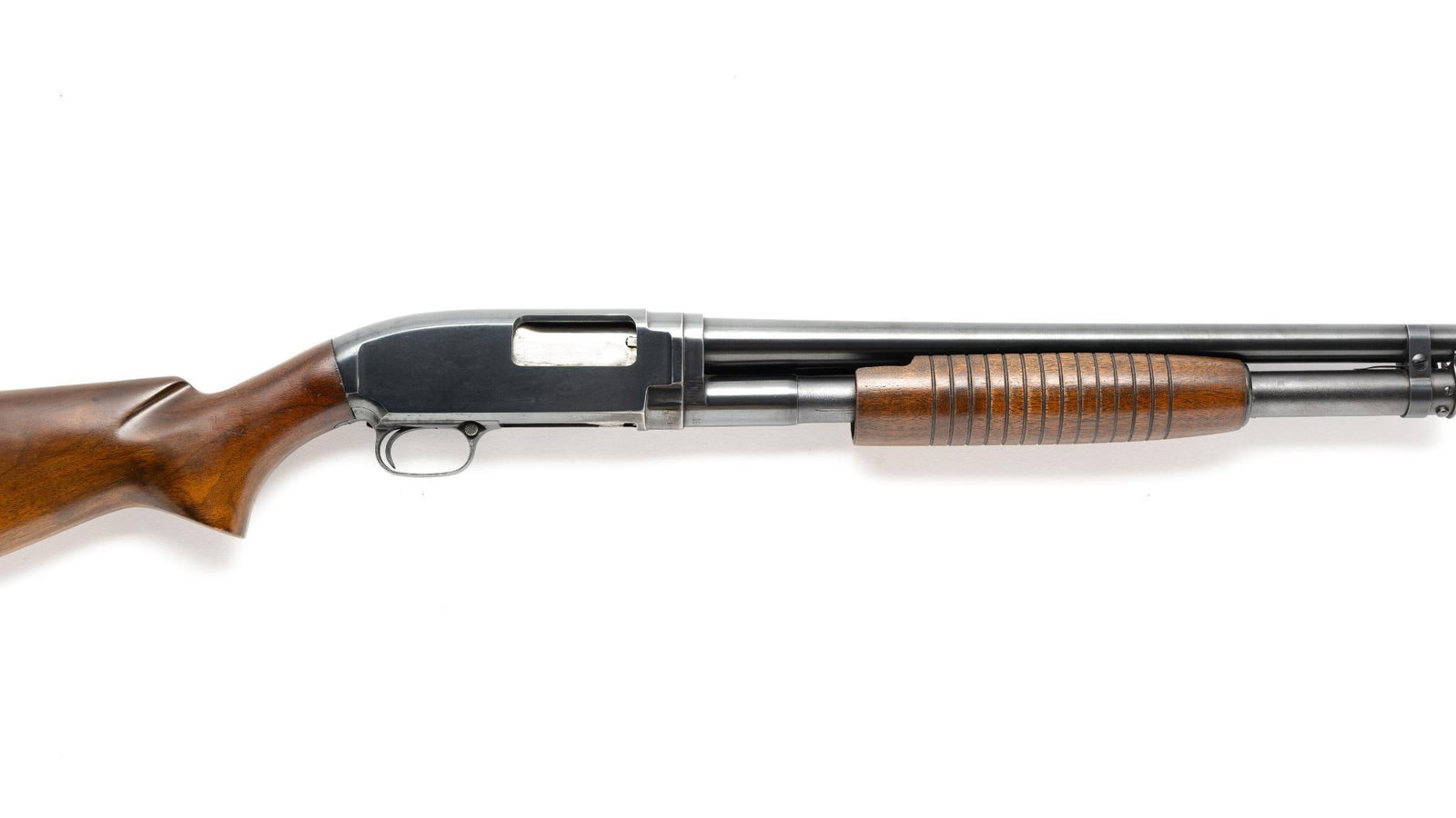 Winchester Model 12 Pump Action Shotgun, Cal. 12 Ga: Serial No. 1664153 With extra barrel. A highly regarded American pump-action shotgun designed by T.C. Johnson for Winchester and introduced in 1912. The Model 12 quickly became known as the "Perfect R