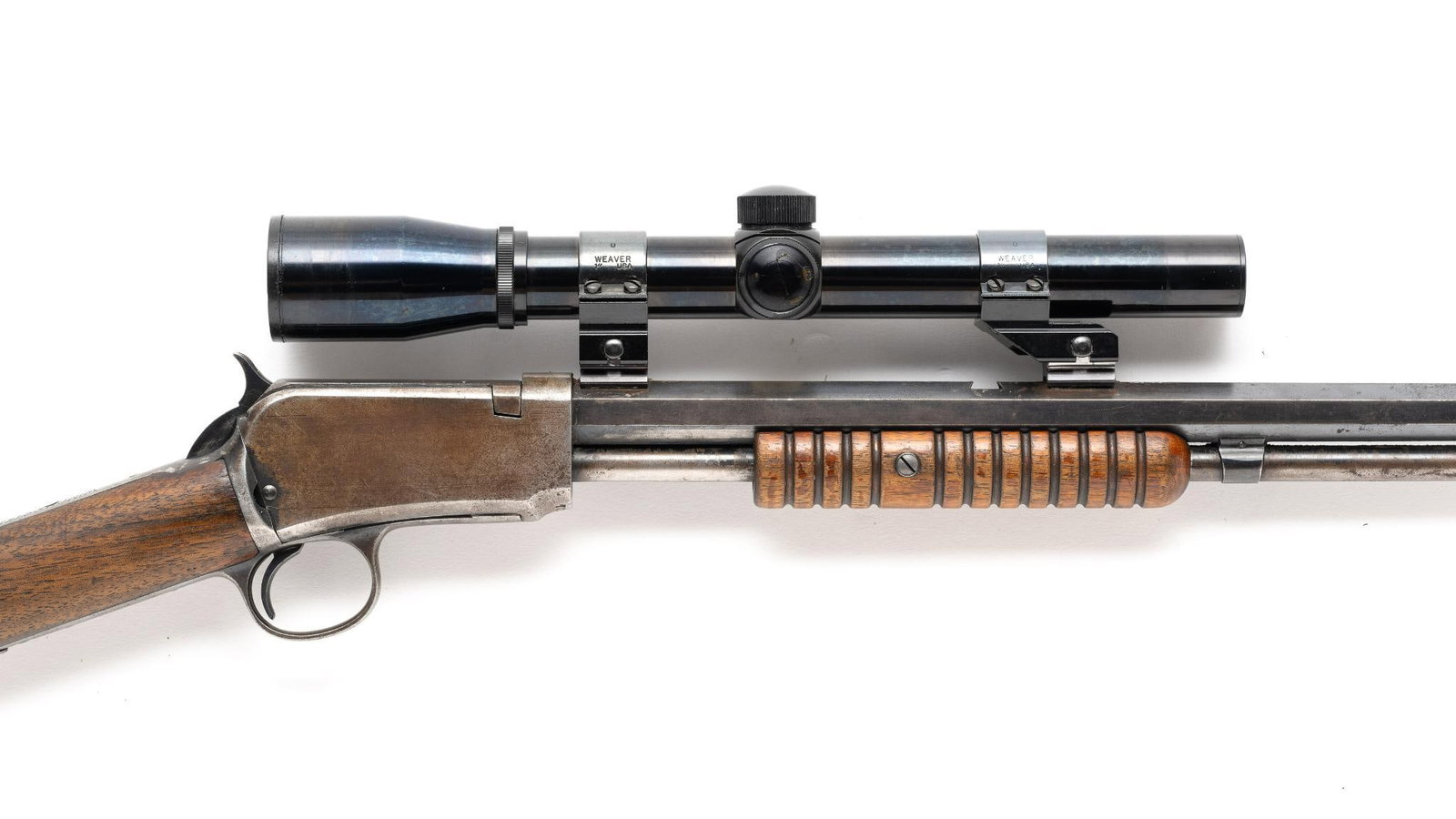 Winchester Model 90 Pump Action Rifle, Cal. .22: Serial No. 702977 Classic American pump action rimfire rifle designed by John and Matthew Browning and manufactured by Winchester Repeating Arms Company. Originally introduced as the Winchester Model 