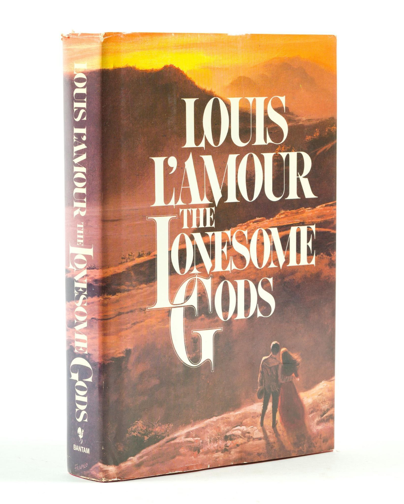 Signed Copy of The Lonesome Gods: Inscribed by Louis L'Amour "To Lory and Dean - two lovely people, Louis L'Amour." Book measures 9-1/4 x 6-1/4" Provenance: From the Estate of Lory Patrick Jones (1933–2026), actress, writer, dir