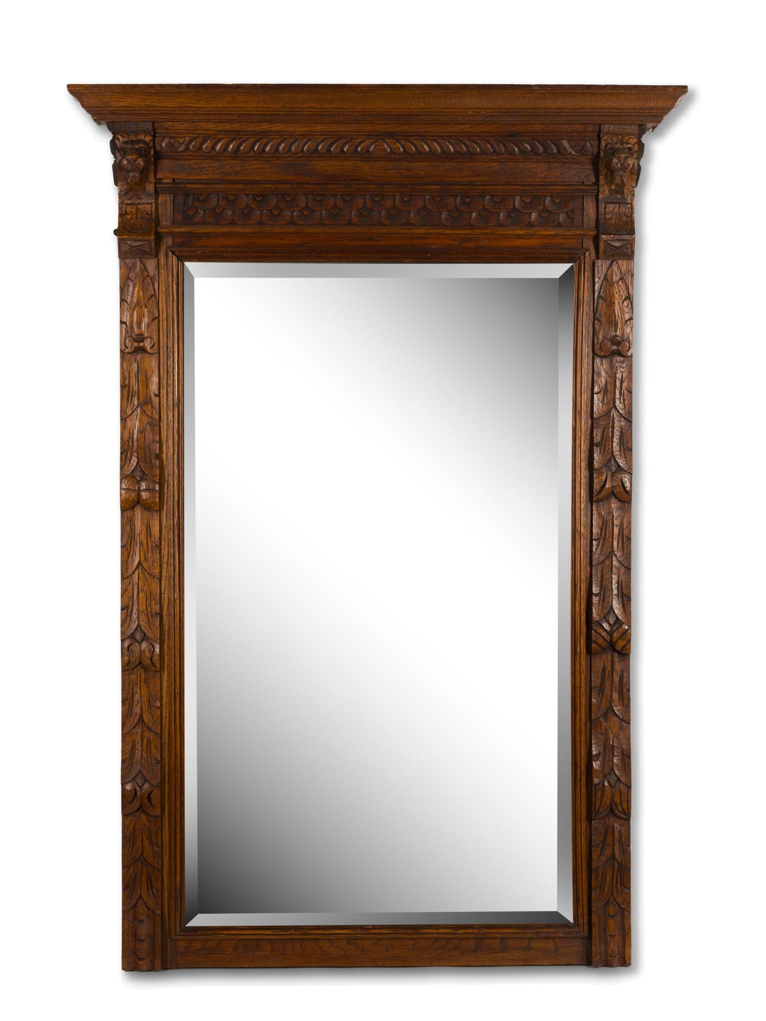 Renaissance Revival Carved Oak Beveled Mirror: Circa late 1800's. 49-1/2" high X 34" wide. Provenance: From the Estate of Lory Patrick Jones (1933–2026), actress, writer, director, and philanthropist known professionally as Lory P