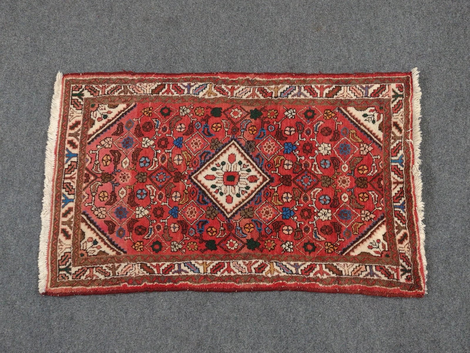 Persian Area Rug: 5' long X 3'2" wide. Provenance: From the Estate of Lory Patrick Jones (1933–2026), actress, writer, director, and philanthropist known professionally as Lory Patrick. During her career, s