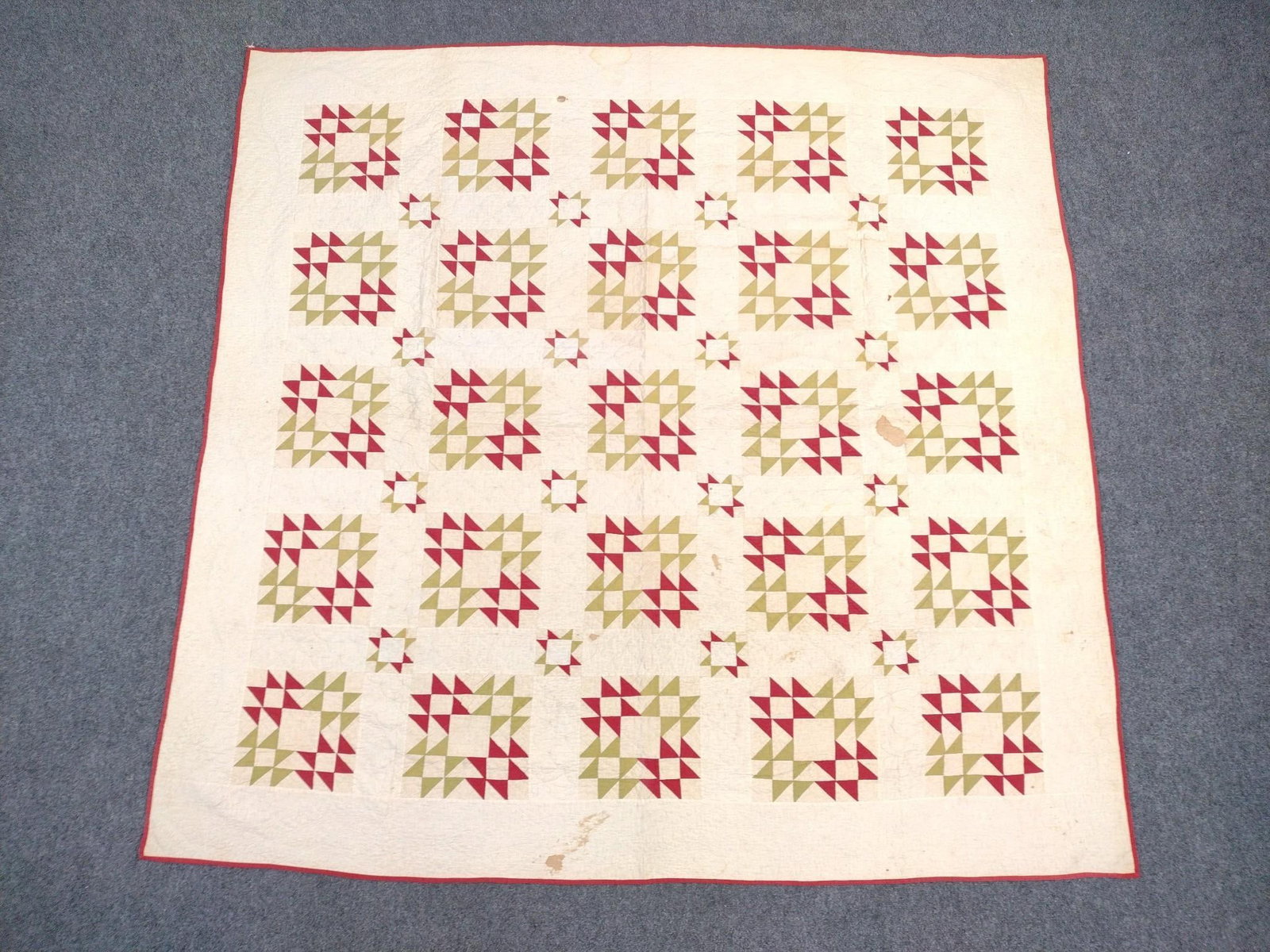 Antique Patchwork Quilt: White with red and yellow-green triangles. 6'9" long X 6'5" wide 