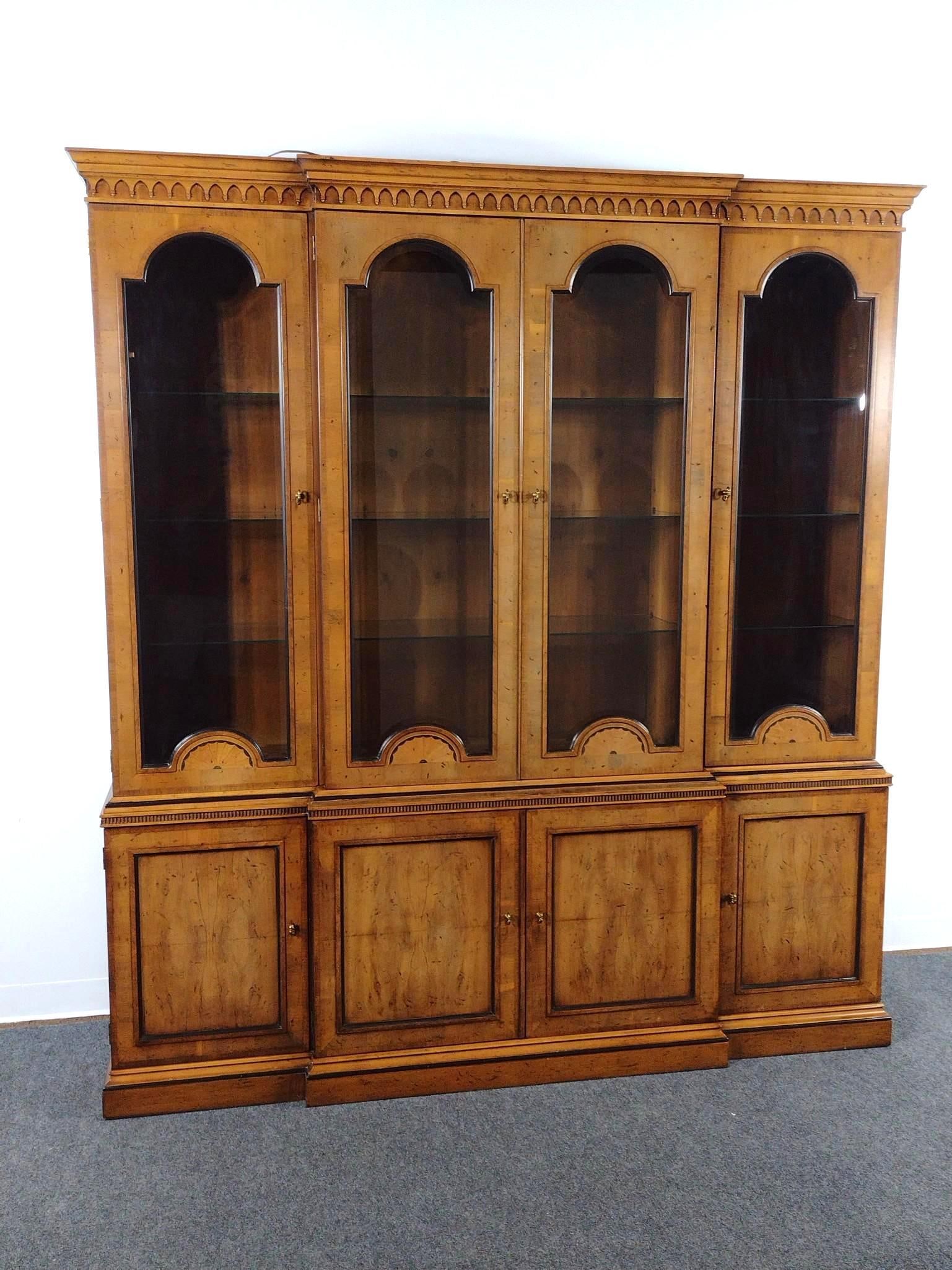 Henredon Breakfront Cabinet: 76" wide X 18" deep X 84" high. One Glass panel has a crack at the top. 