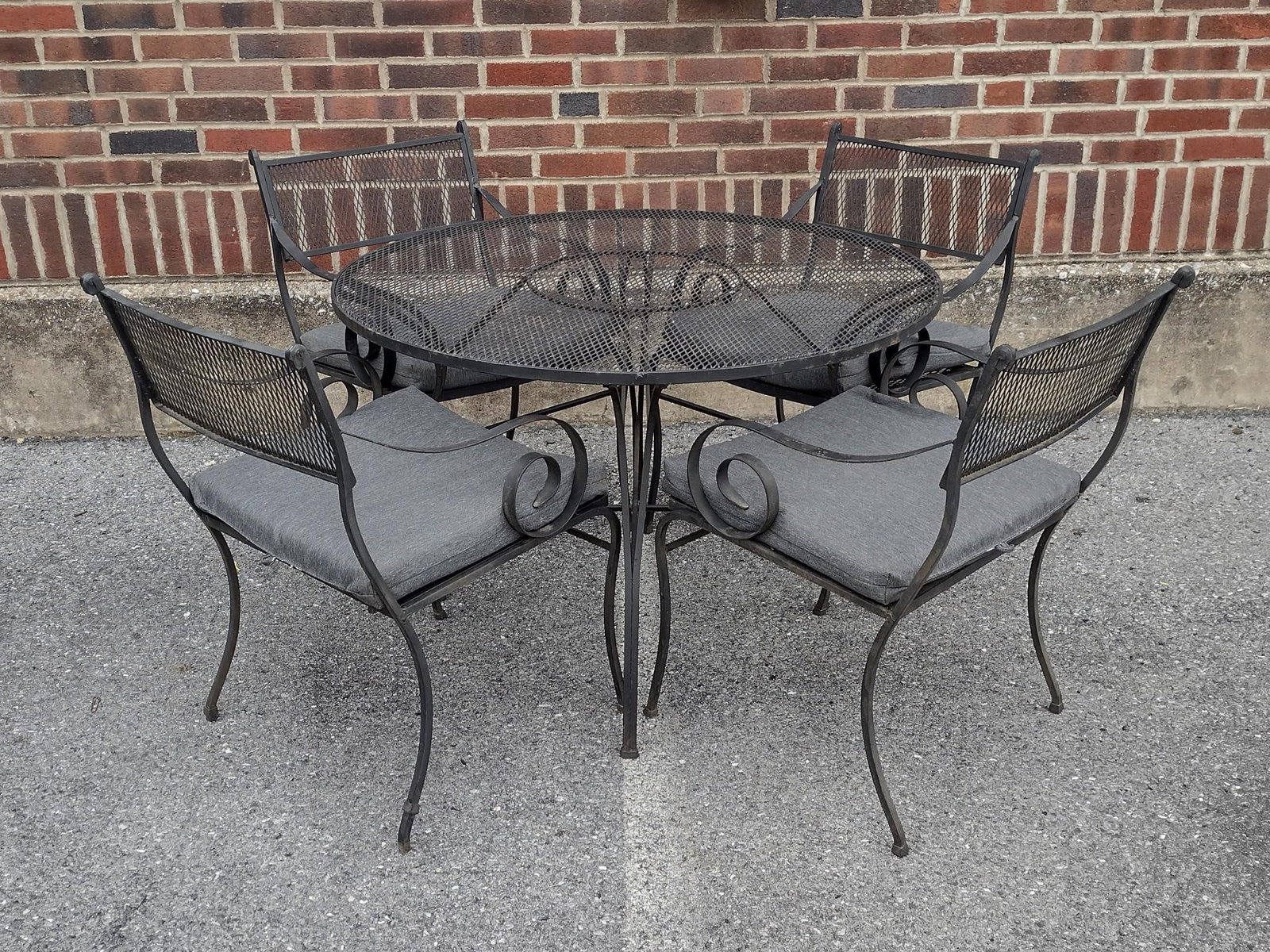 Metal Outdoor Table With 4 Chairs: Table 41-1/2" diameter X 26" high. Chairs 21" wide X 20" deep X 31-1/2" high. All have some paint loss and rust.