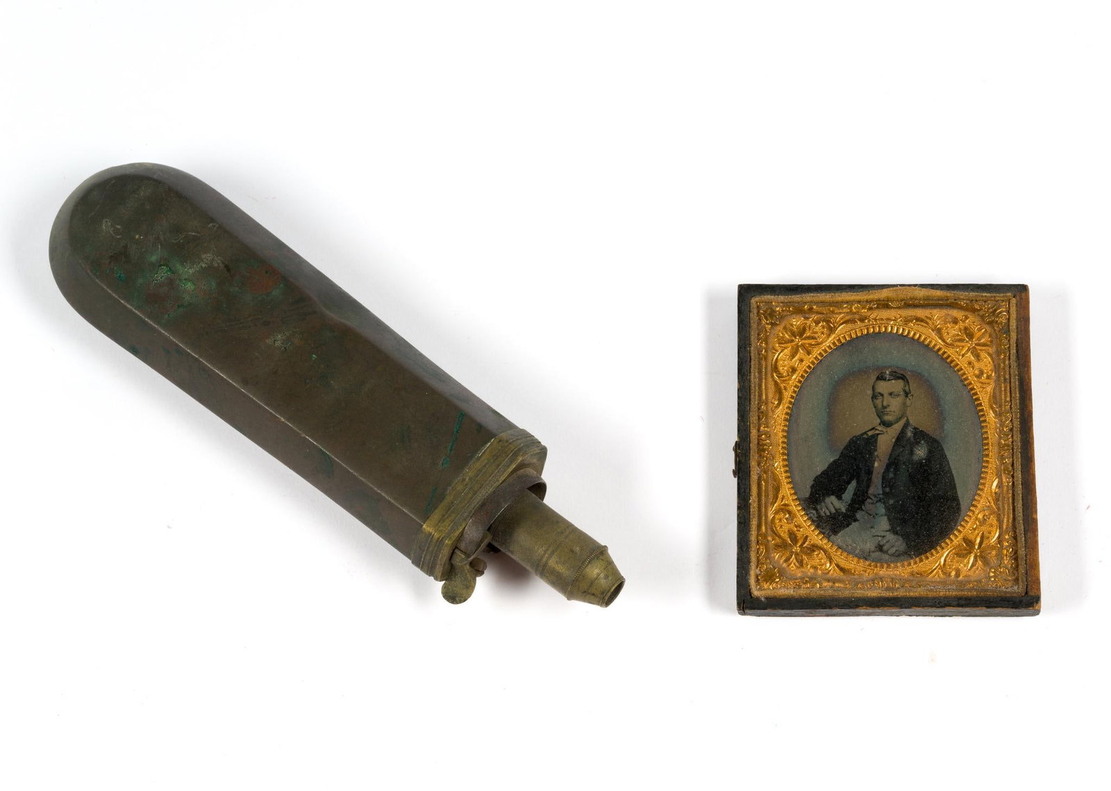 Tin Type & Antique Brass Powder Loader: Tin type measures 3-1/4" x 3-3/4" and the Civil War-era brass powder loader measures 2-1/4" x 1" x 7-3/4". 
