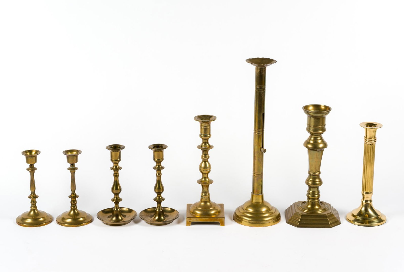 8 Brass Candlesticks (1 of 3)