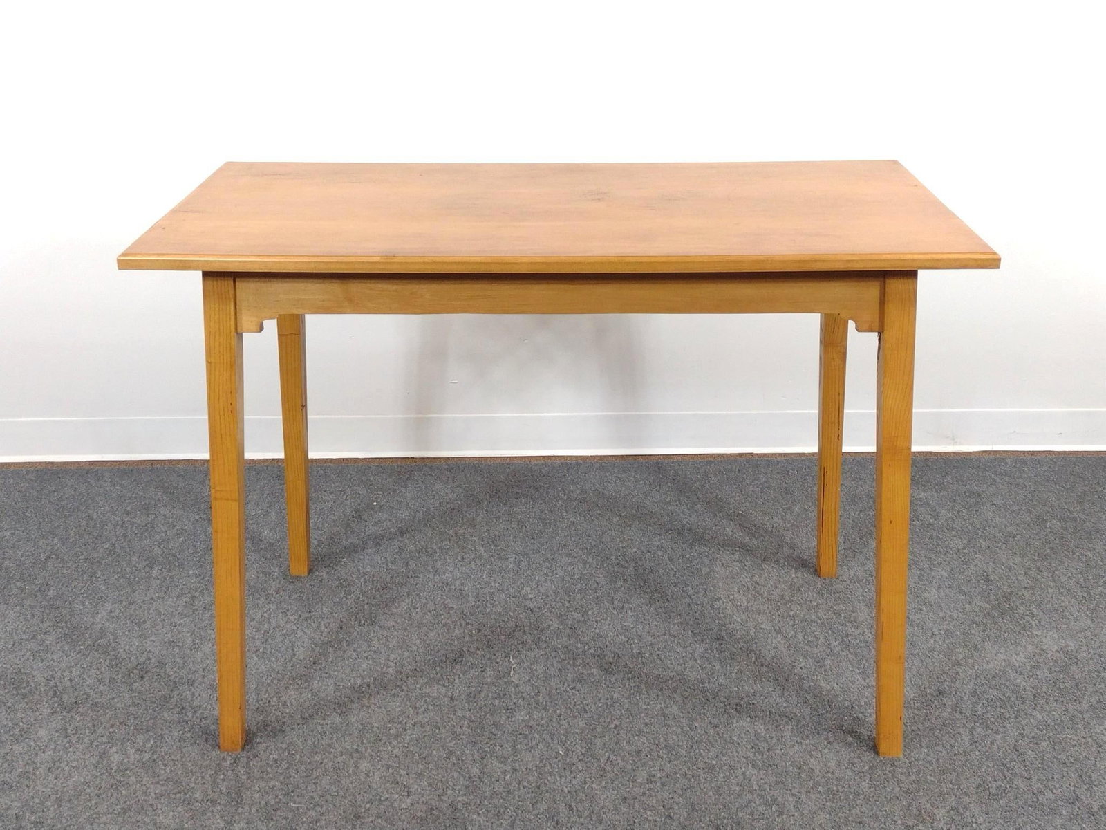 Paul Hardy Jr Hand Crafted Desk: 44" wide X 21-1/2" deep X 31" high. Top has some light scratches. Provenance: Living in a log cabin in the woods is the perfect setting for a man who has always loved and tinkered with wood. After