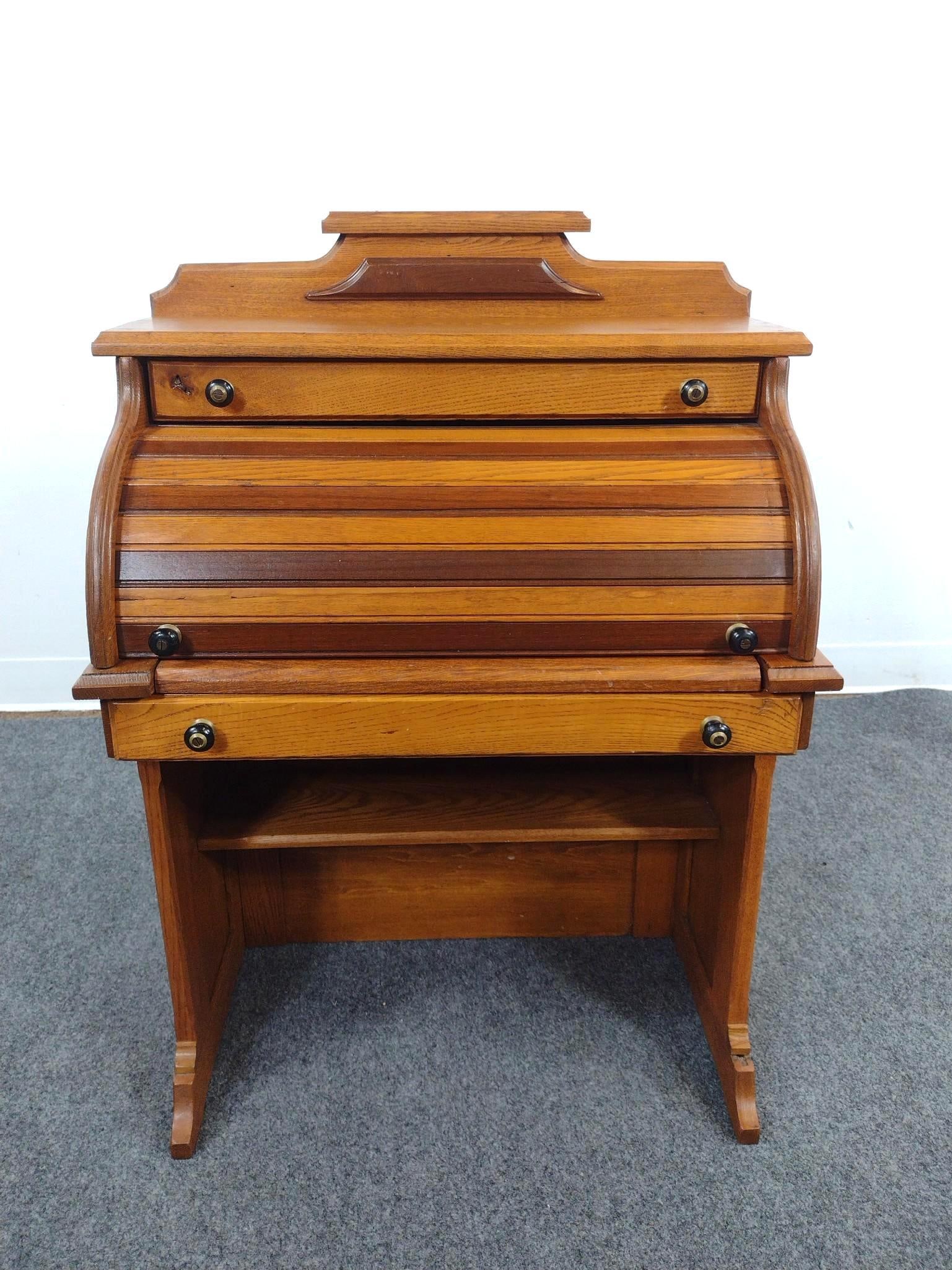 Childs Roll Top Desk: 24" wide X 14" deep X 33-1/2" high. 