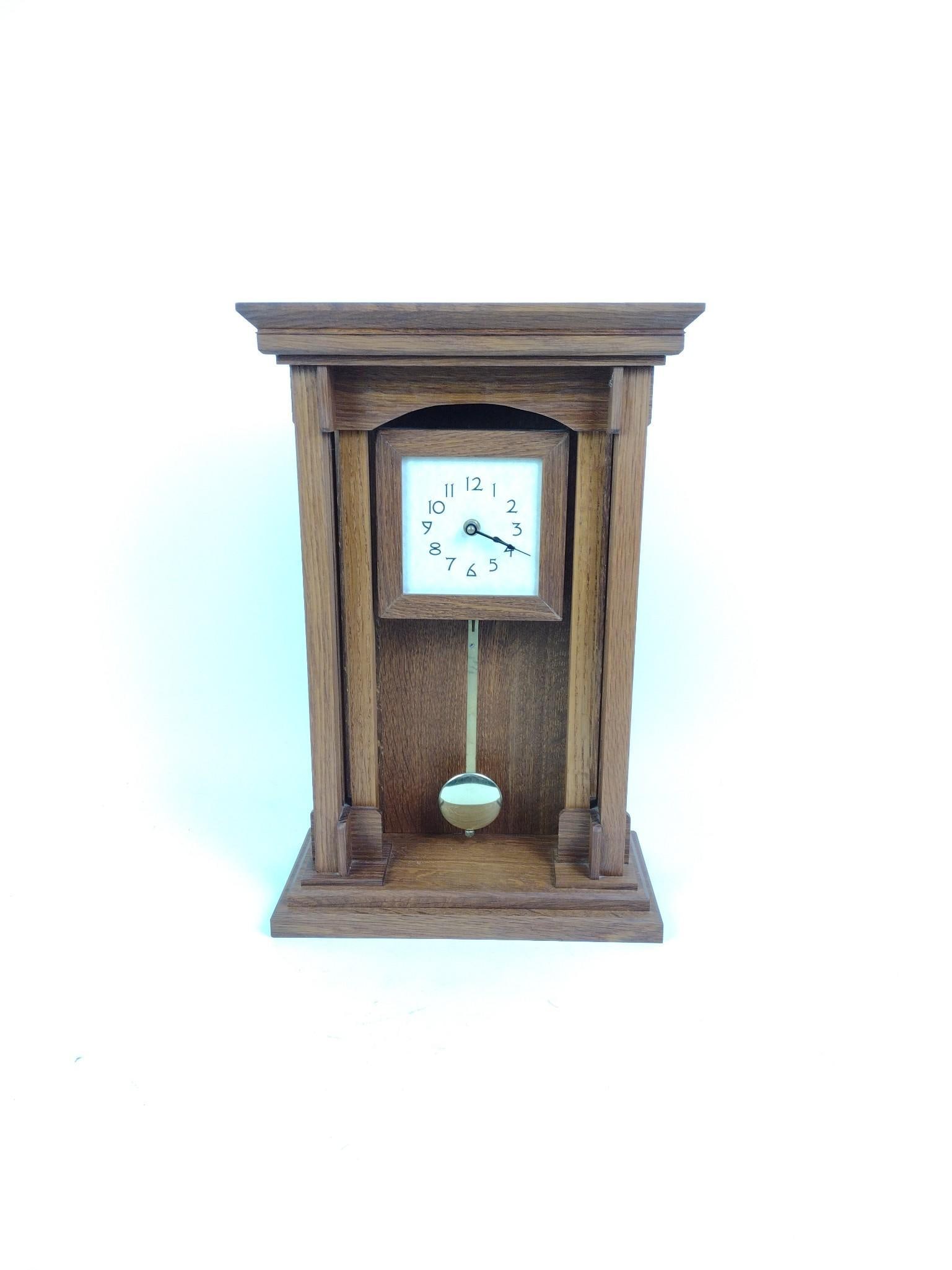 Paul Hardy Jr. Arts & Crafts-Style Mantle Clock: Measures 12" x 6" x 18-1/4". Provenance: Living in a log cabin in the woods is the perfect setting for a man who has always loved and tinkered with wood. After retirement, it was time to get serious.