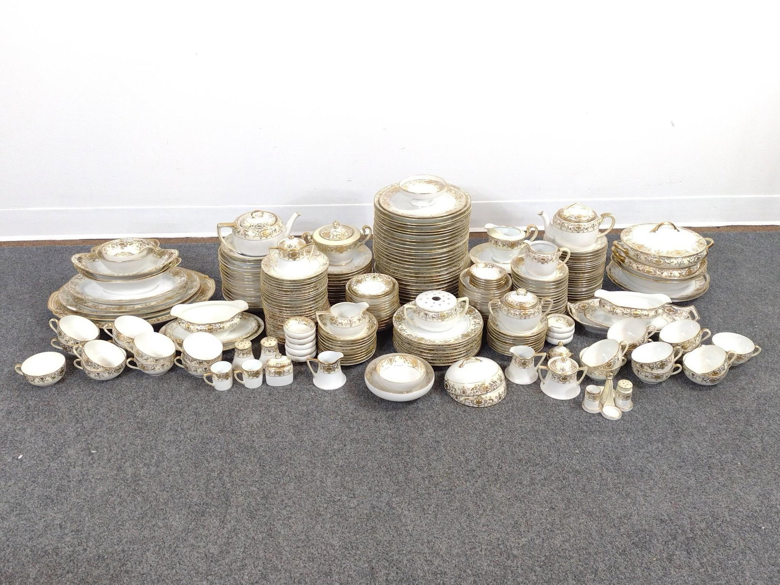 275 Piece Noritake "Christmas Ball" Dinner Service: Dinner plate measures 10" in diameter, and smallest piece measures 1-1/4" x 1-1/4" x 1-3/4". Includes 275 pieces.