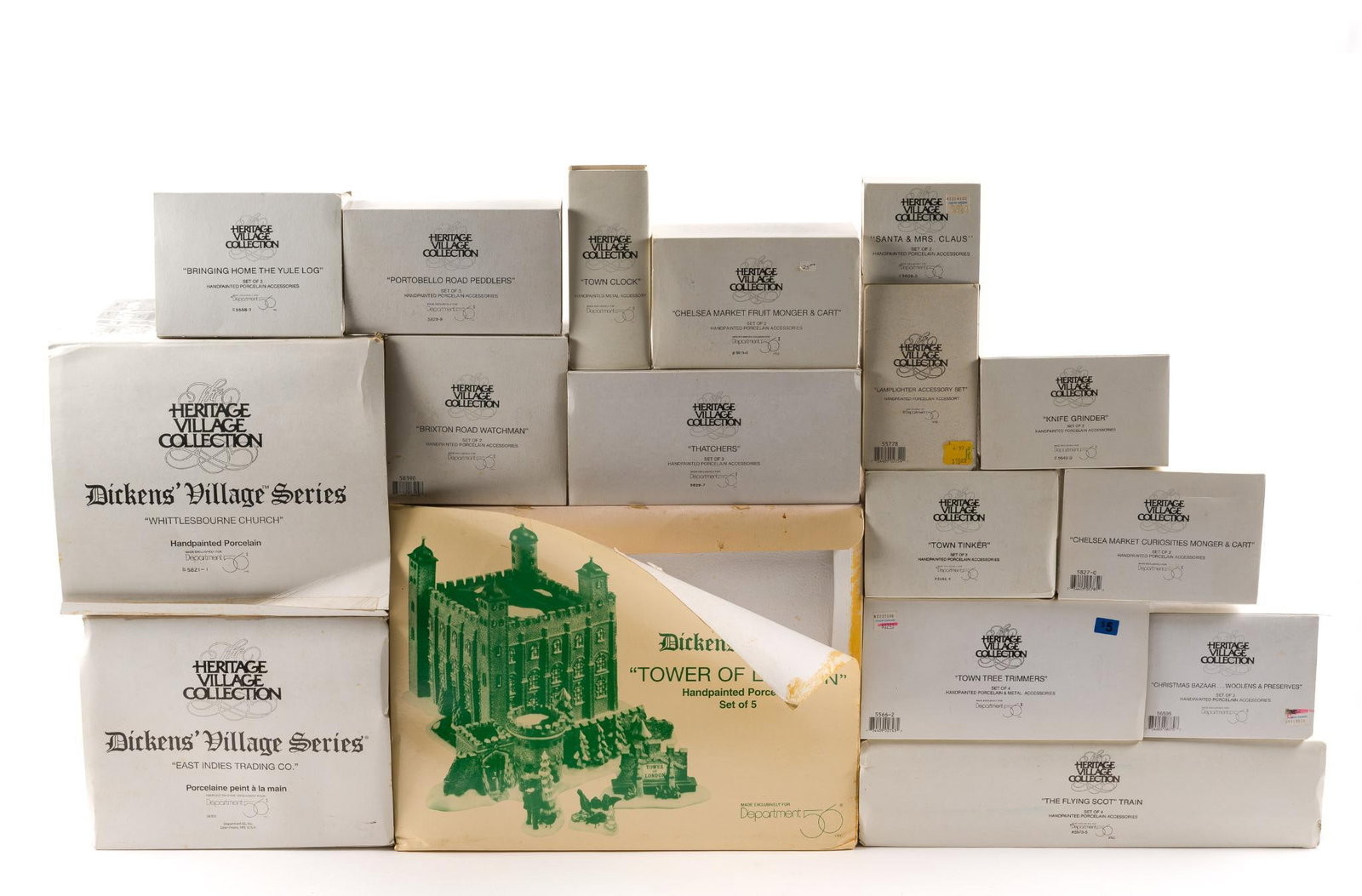 18 Dept 56 Heritage Village Collection Incl. Dickens Village: Includes "Tower of London," "East Indies Trading Co.," and "Whittlesborn Church." Also includes 13 smaller boxes of Heritage Village figurines, some in partial boxes. 
