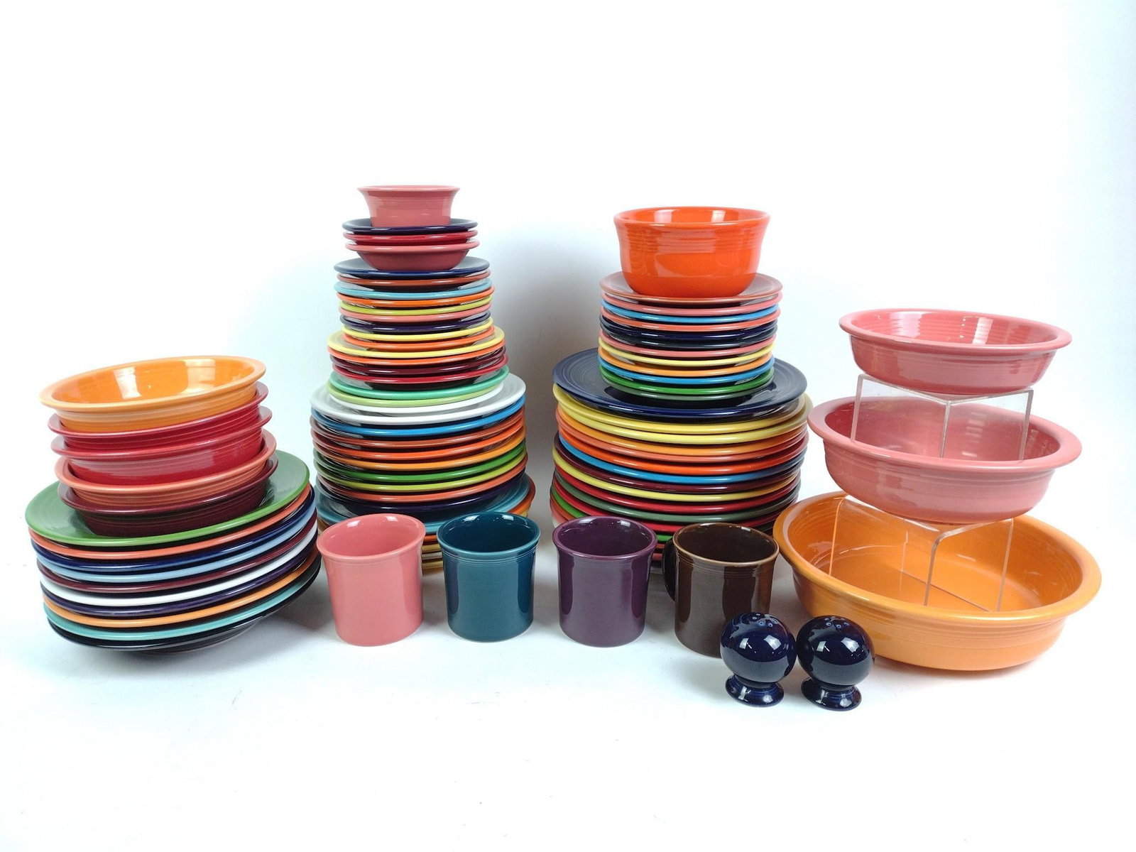 86 Homer Laughlin Fiesta Ware: Dinner plate measures 10-1/4" in diameter, and smallest piece measures. 2-1/4" x 2-1/4" x 2-1/2". Wear consistent with use. 