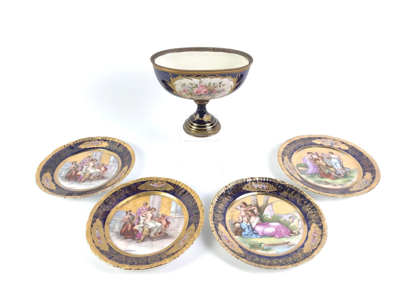 French Sevres Style Porcelain Centerpiece Incl. Austrian Style Plates: French Sevres-style porcelain centerpiece in good condition, and four Victoria Carlsbad Austria plates of similar design, also in good condition. 8-1/2 x 1" to 6-1/4 x 7-1/2". 