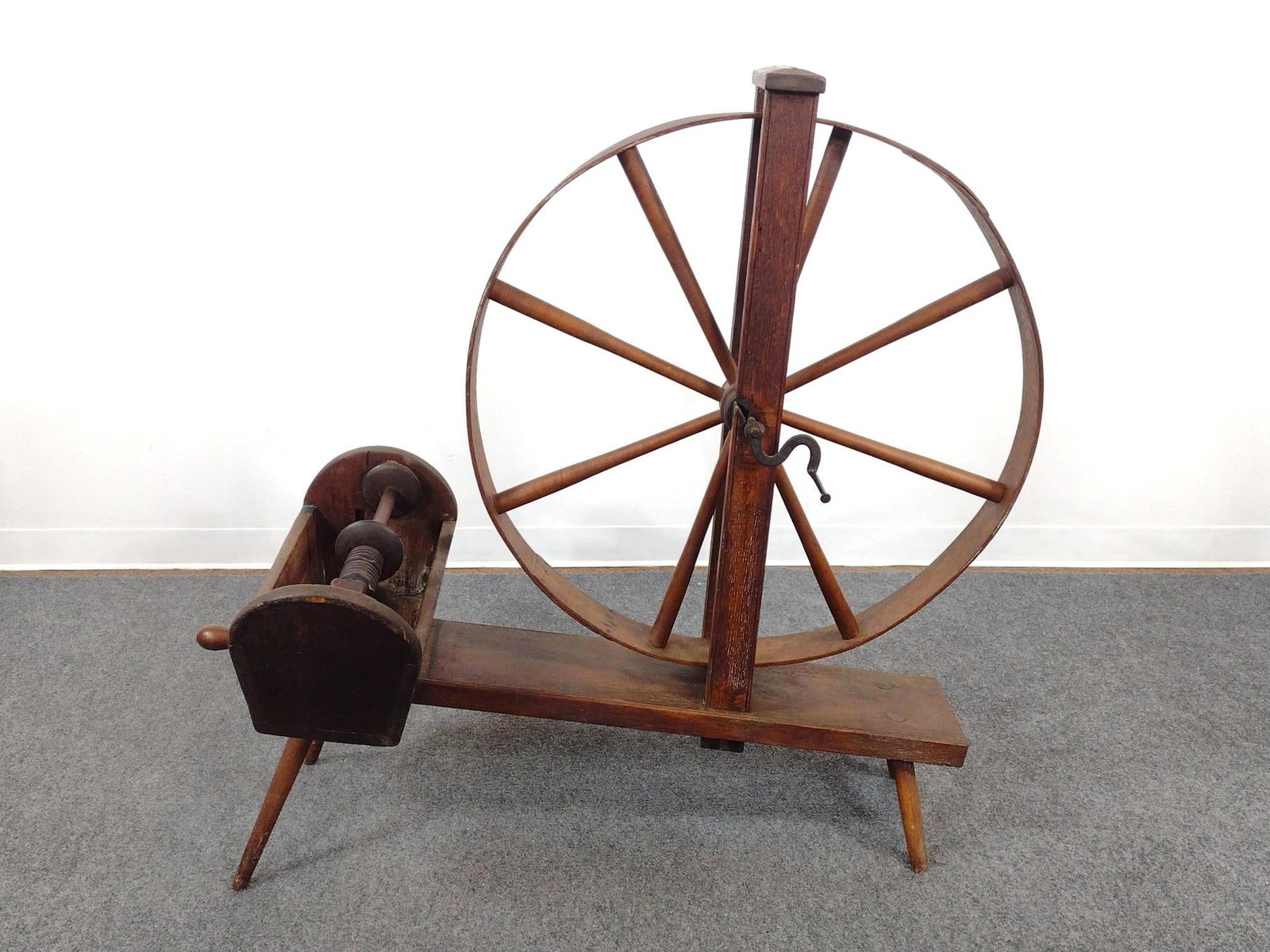 Spinning Wheel: 19-1/4" wide X 48" deep X 45" high. Has wear consistent with age.