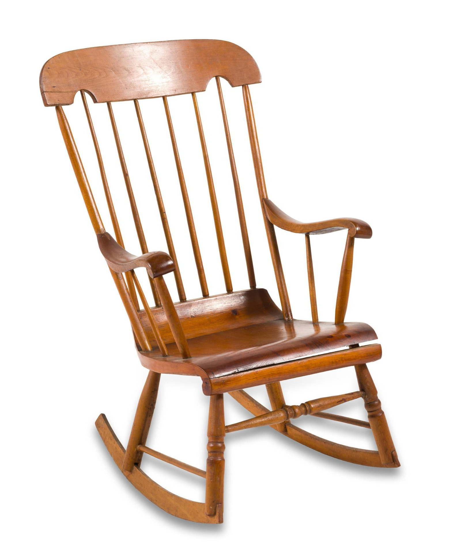 Boston Rocker: A mixed softwood Boston rocker probably Pennsylvania consisting of scroll seat with uprights and a shaped crest rail. circa 1850. Refinished. Bottom lip of seat is starting to split away from main