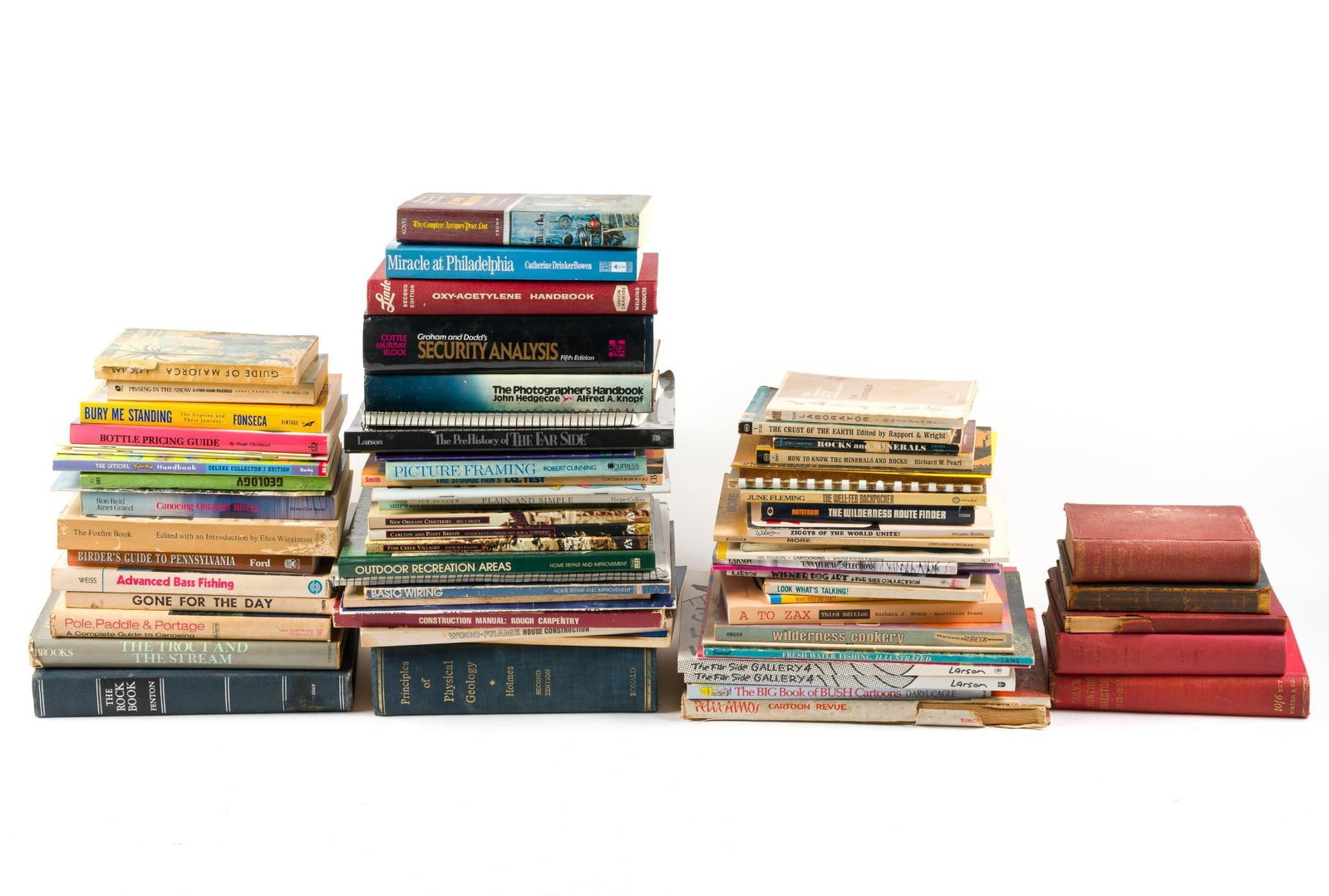 Large Assortment of Vintage Books: Includes books on carpentry, hunting, fishing, welding and more. Also includes Farside comic books. Largest box of books measures 13" x 17" x 7". 
