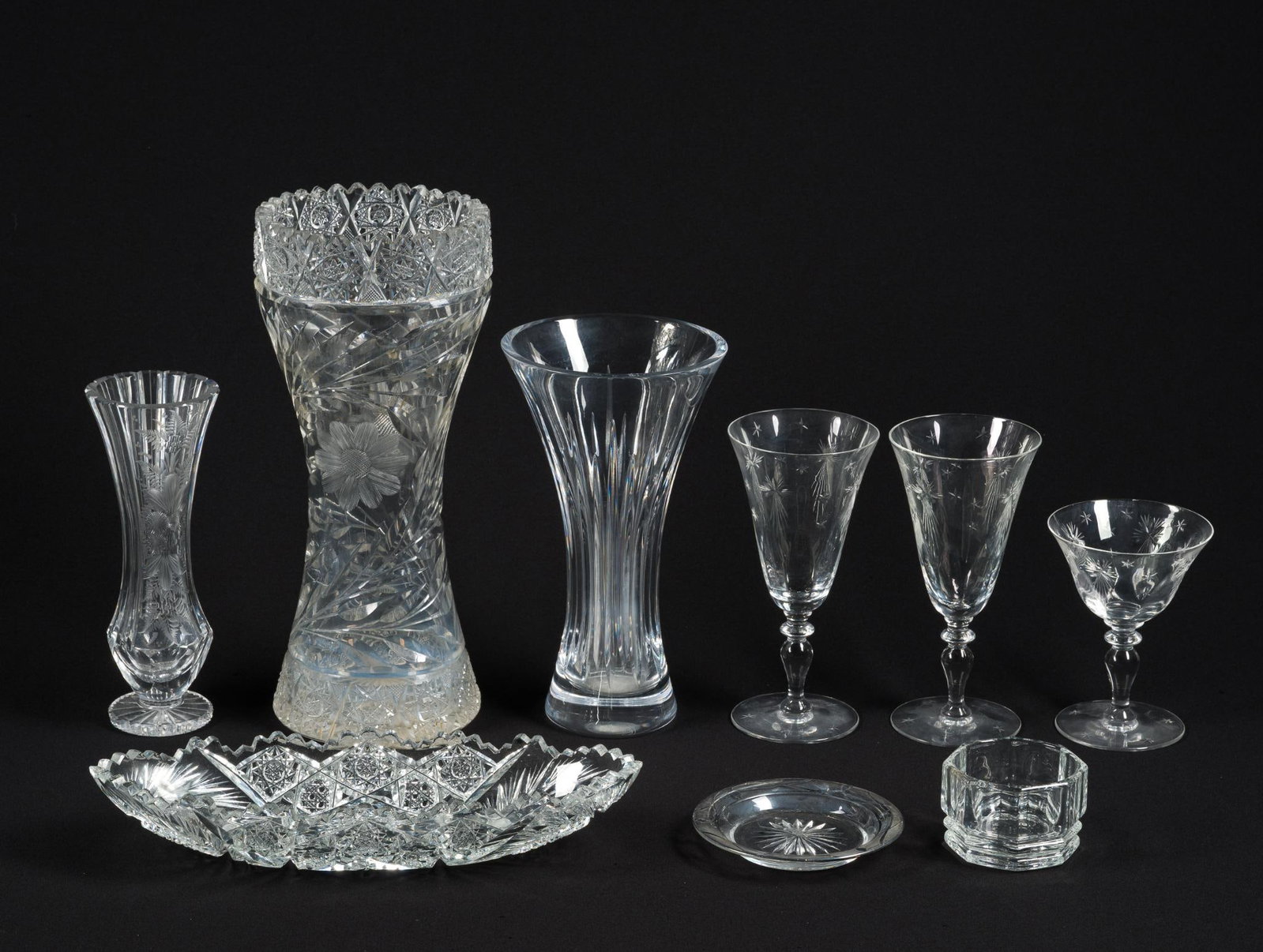 Glassware Incl. Hawkes: Includes 3 signed "Hawkes" glasses, 3 unsigned vases, 1 ashtray, 1 candy dish, and 1 cut glass celery dish. All in good condition, consistent with age and use. Smallest piece measures 2-3/4"; largest 