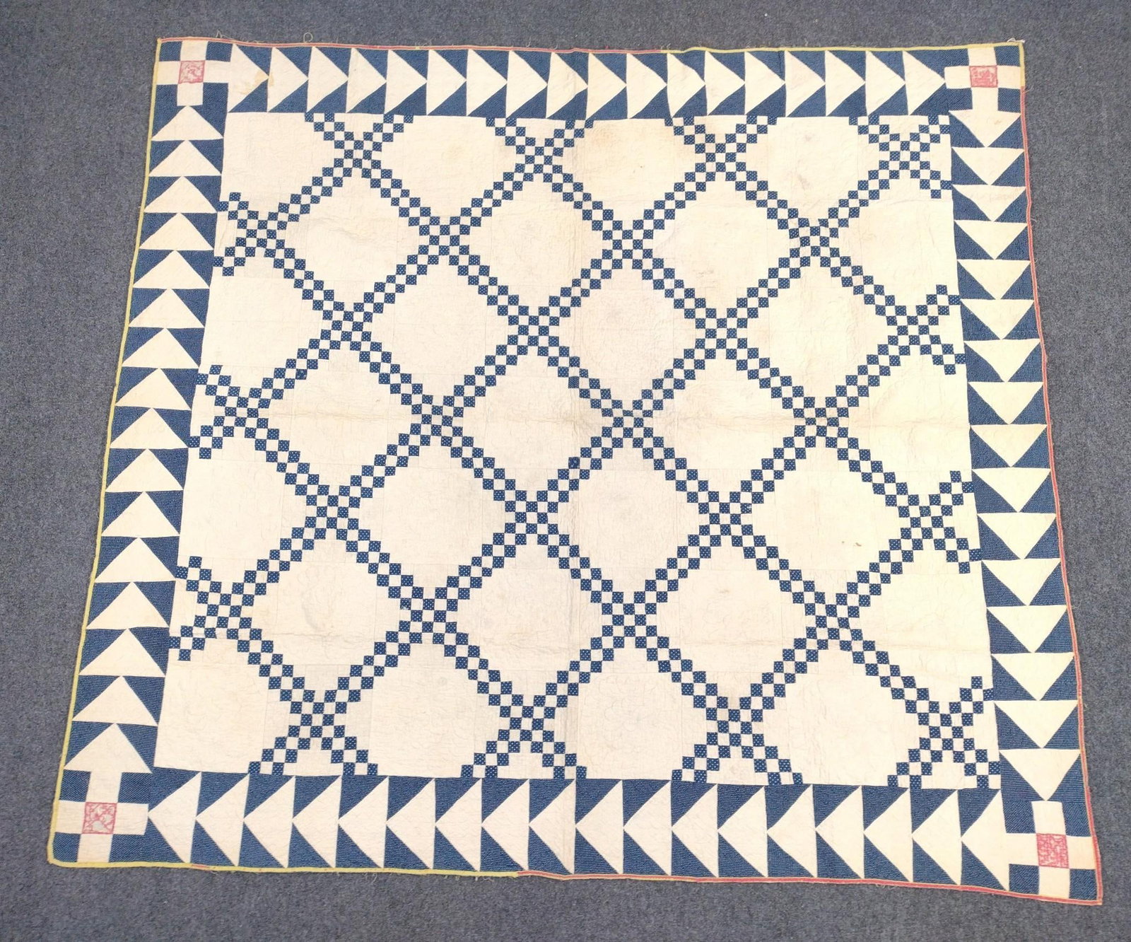 Blue and White Patchwork Quilt: Late 19th century. 7'4" long X 6'8" wide.