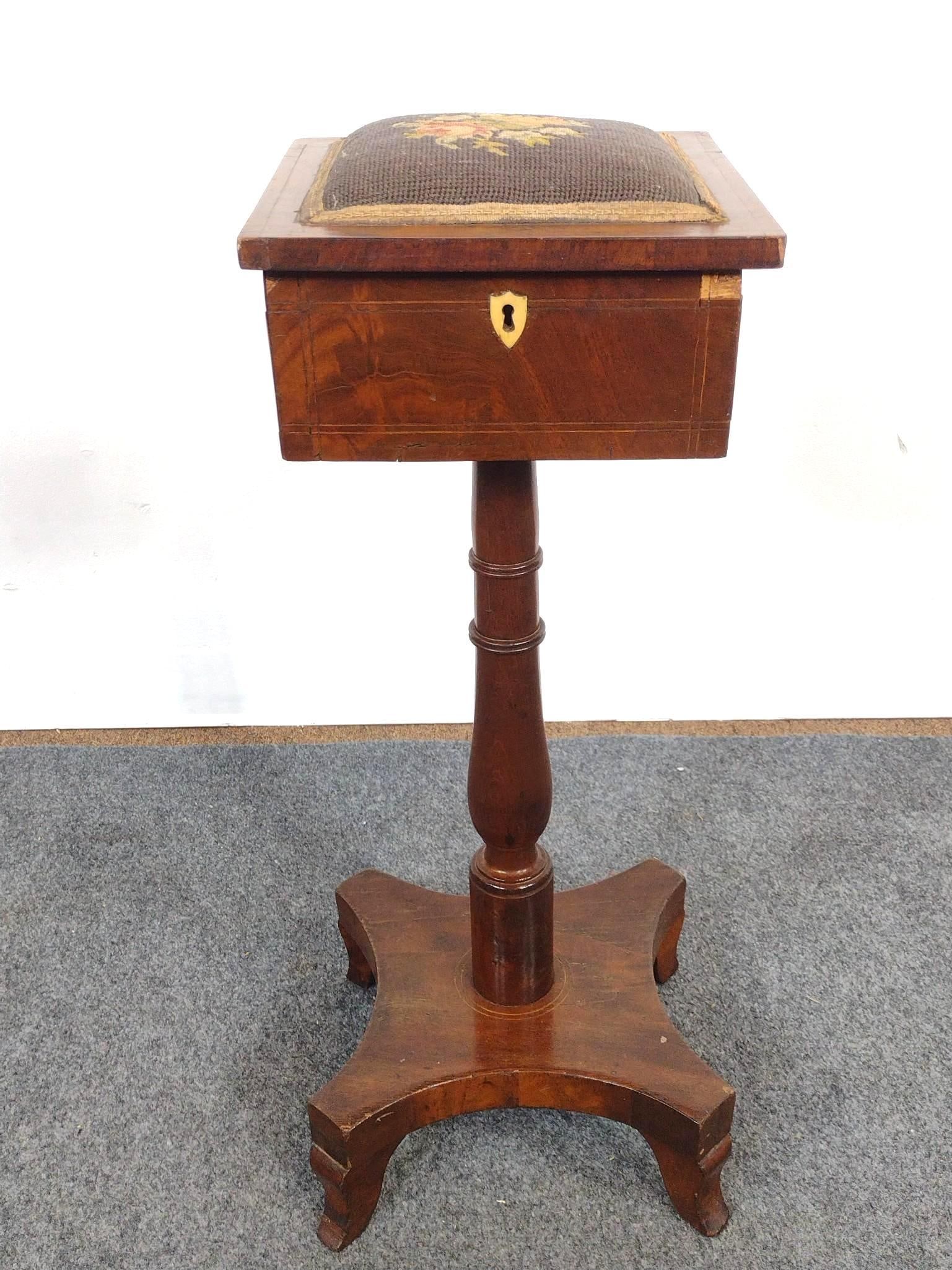 Antique Pedestal Sewing Stand: 10-1/2" wide X 10-1/2" deep X 29" high.has area of veneer loss. Also has some scratches and areas of discoloring. Hinge for lid is broken.