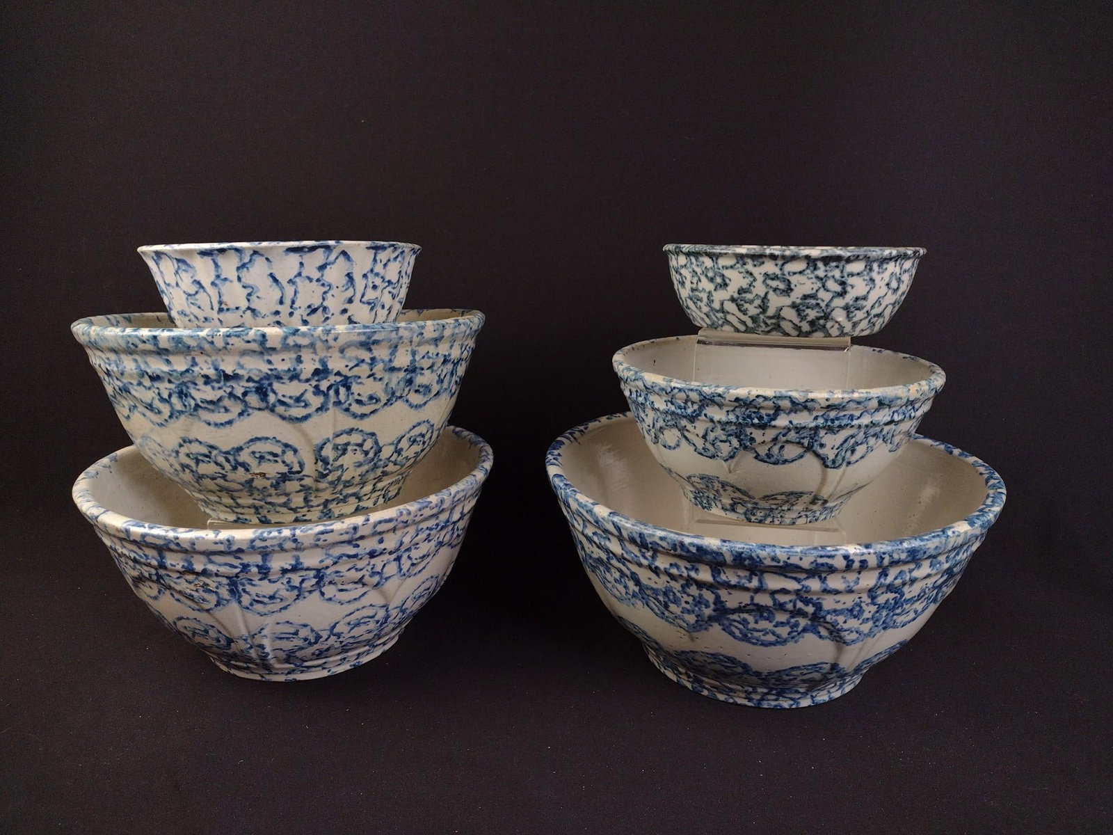 6 Antique Spongeware Bowls: Largest measures 13-1/4" x 13-1/4" x 6-1/4" and smallest measures 7-1/4" x 7-1/4" x 2-1/4". Three of the bowls have small cracks that do not affect the structure of the bowl. 
