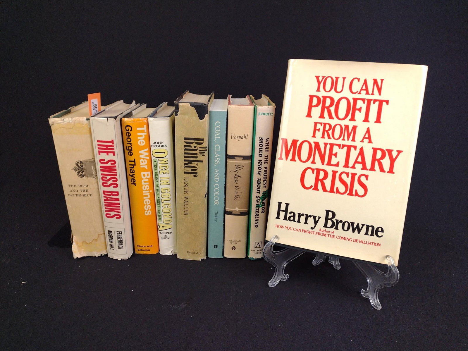 9 International Finance Books: Includes "The Rich and the Super-Rich" by Ferdinand Lundberg, "The Swiss Banks" by T. R. Fehrenbach, "The War Business" by George Thayer, "Once in Golconda" by John Brooks, "Th