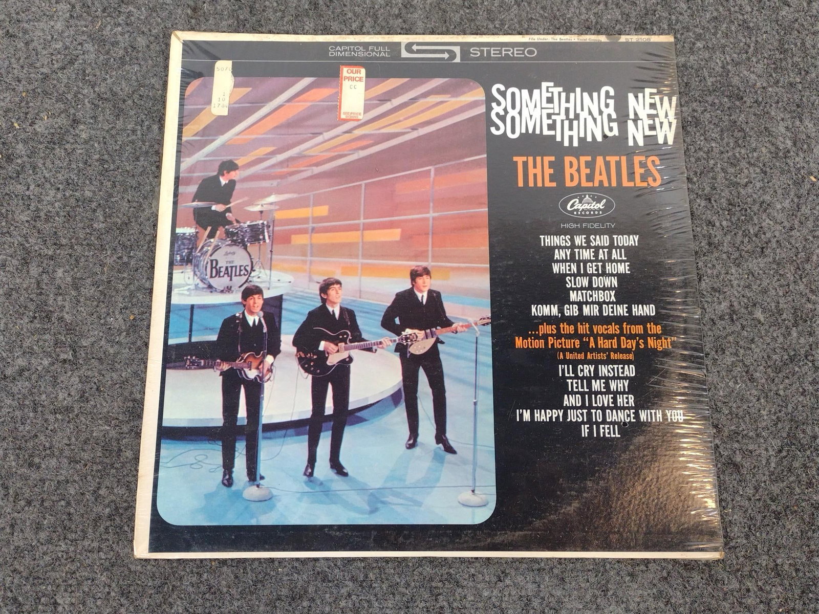 Something New By The Beatles Second Pressing: Still in its original plastic, never has been opened. Measures 12-1/2" x 12-1/4". U.S. pressing. 