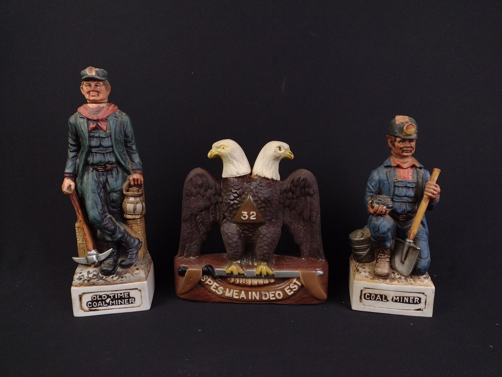 3 Vintage Decanters Incl. Commonwealth Distillery: Eagle decanter measures 9" x 3" x 9-1/4" and the tallest miner decanter measures 4" x 3" x 13". 