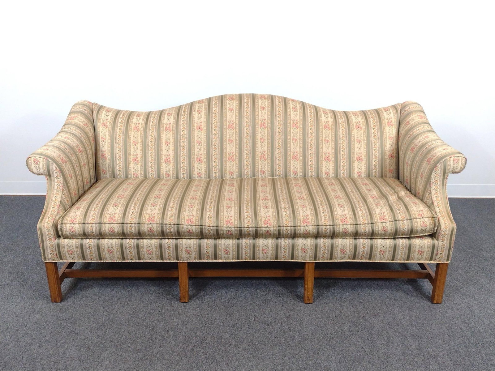 Chippendale Style Sofa: 76" wide X 31" deep X 33" high. Has a few spots of discoloring. Comes with cover.