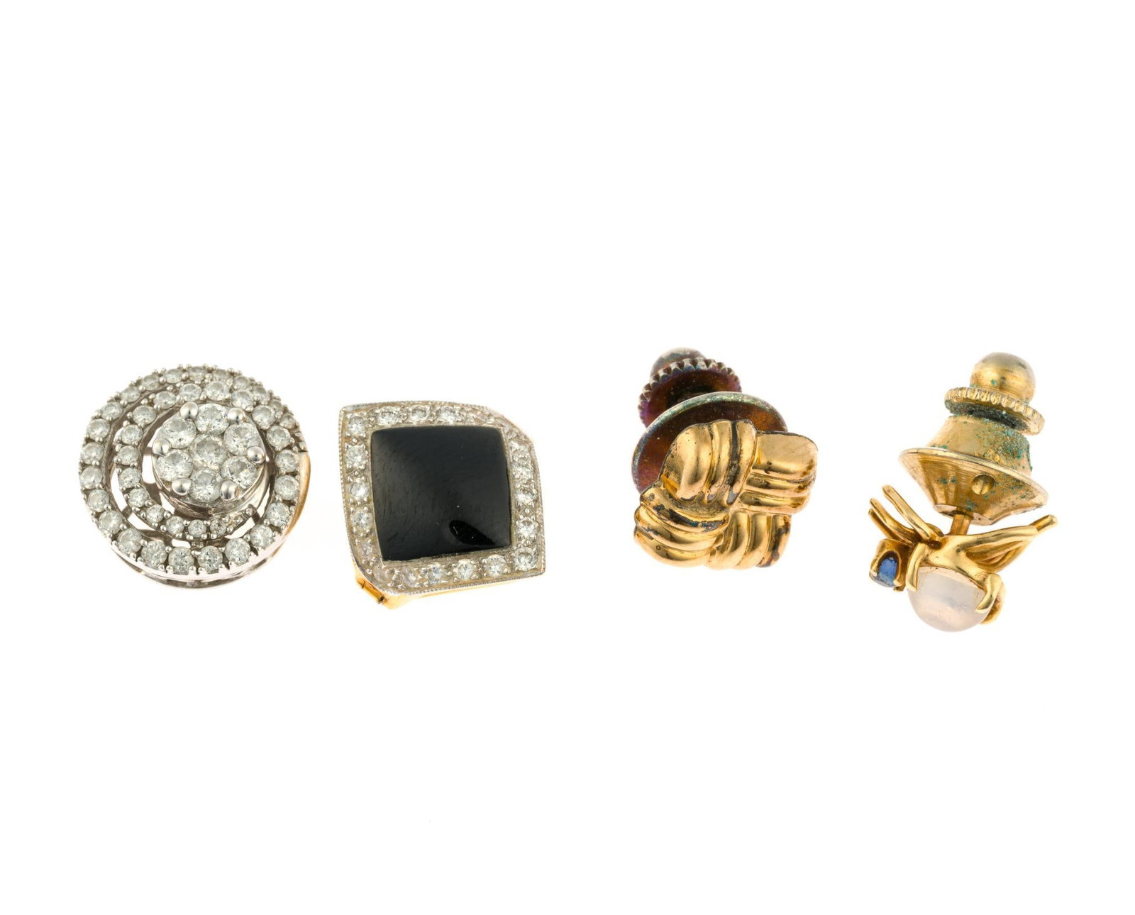 14K and 18K Gold Pendants and Pins: A white gold 14k pendant with diamond swirl 1/2" diameter, a diamond and onyx 18k pendant 1/2" width and weighing 3.7 grams, two smaller pins of which one is a spider form. The weight of 14k pieces is