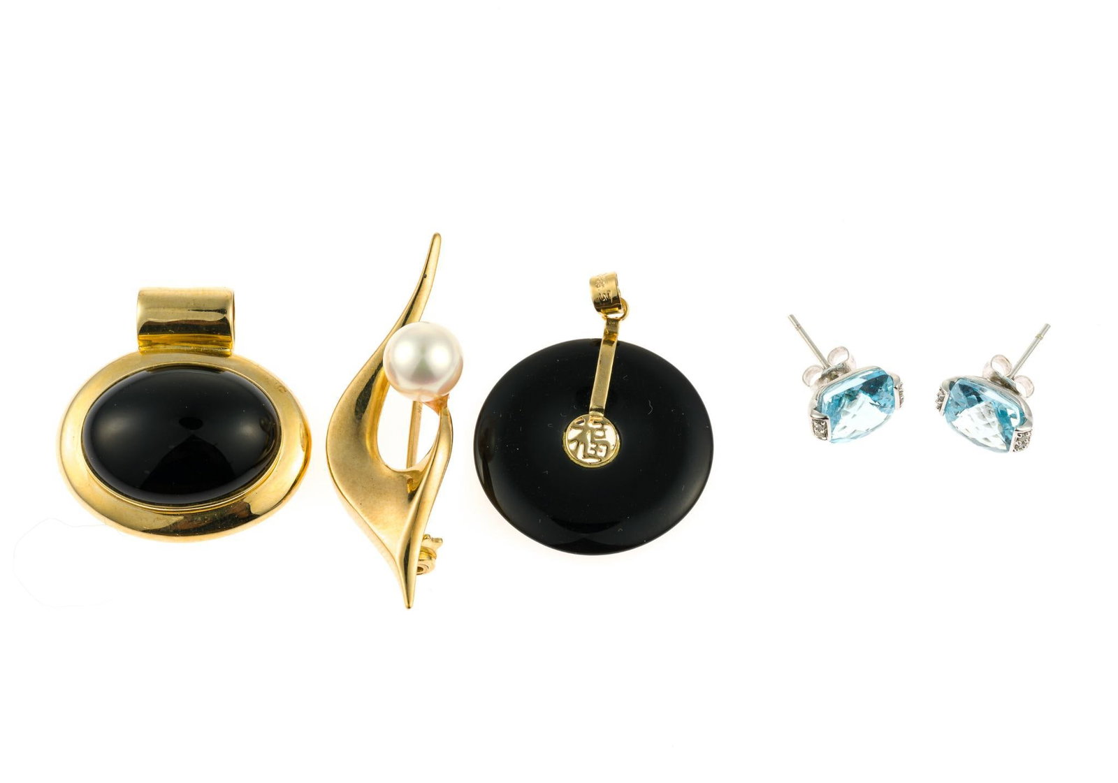 14K and 10K Gold Jewelry: 10k white gold and topaz stud earrings, two 14k yellow gold and onyx pendants and one unmarked pearl and 14k yellow gold (testing 14k gold) brooch. The 10k earrings weigh 2.4 grams and the 14k pieces 