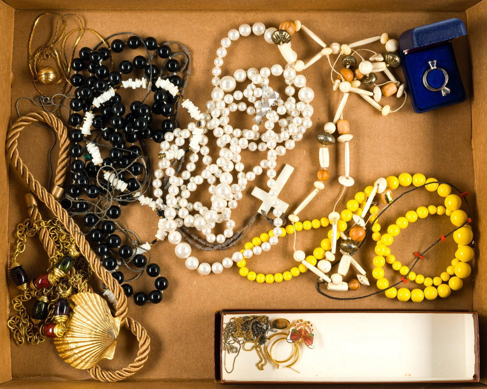 Costume Jewelry: Also includes a carved bone necklace and a small sterling chain necklace. Box is 13" wide x 16-7/8" long x 2-1/4" high. 